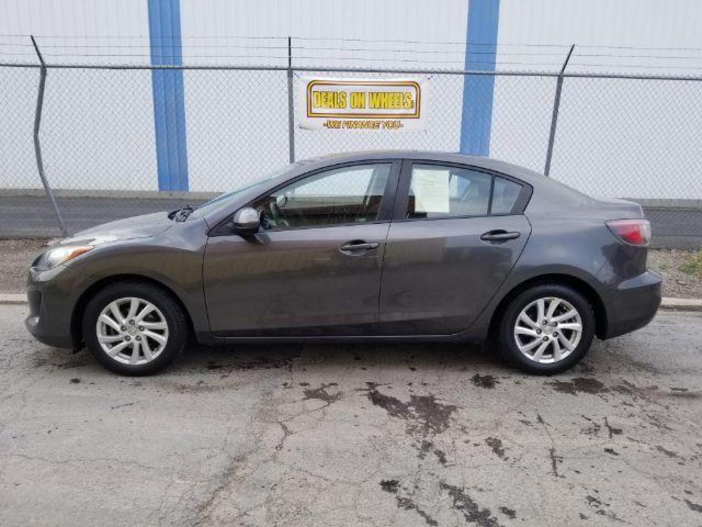 2012 Mazda MAZDA3 i Touring 4-Door (JM1BL1V86C1) with an 2.0L L4 DOHC 16V engine, located at 4047 Montana Ave., Billings, MT, 59101, 45.770847, -108.529800 - Photo#2