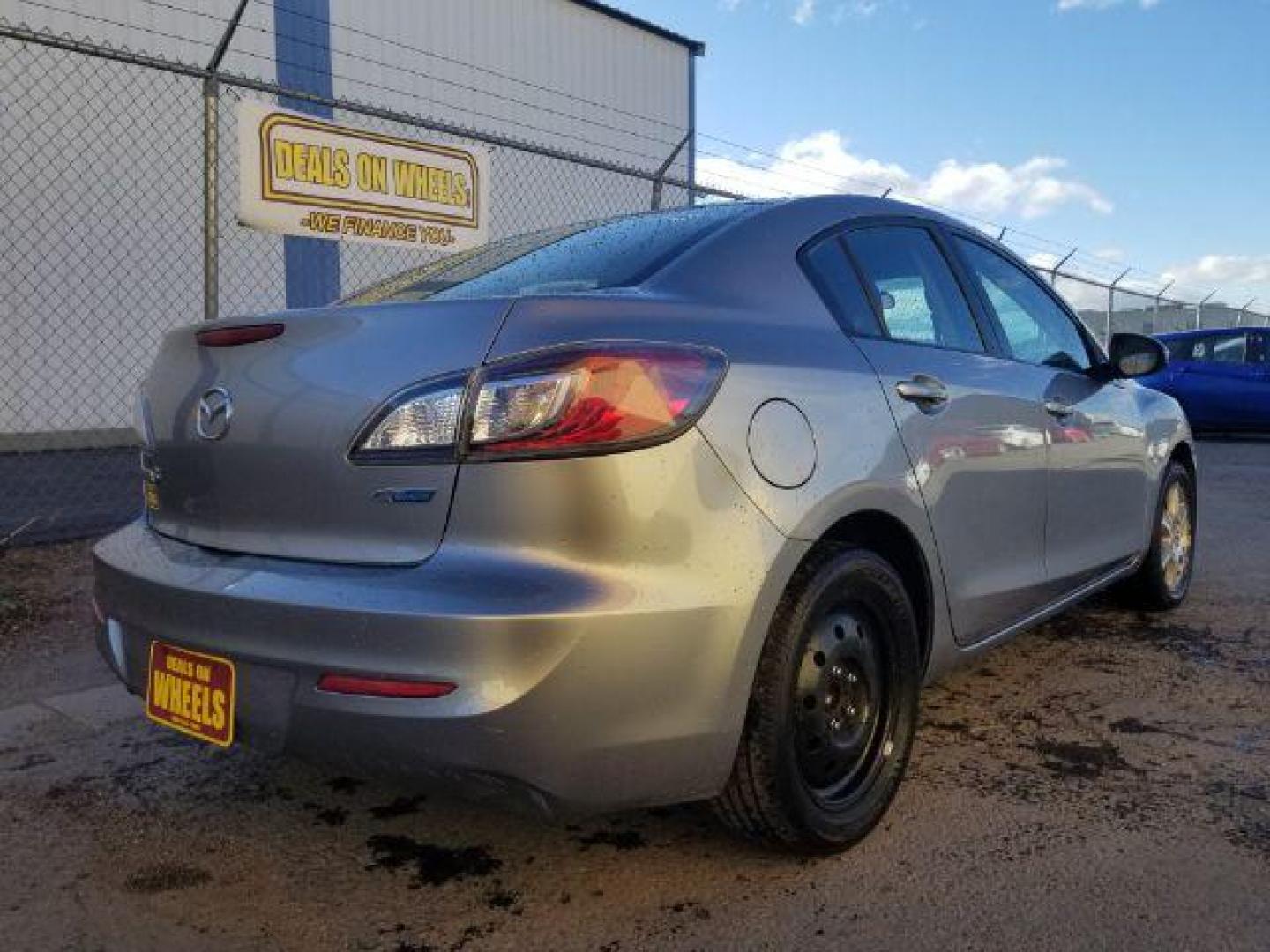 2012 Mazda MAZDA3 i Touring 4-Door (JM1BL1V83C1) with an 2.0L L4 DOHC 16V engine, located at 4047 Montana Ave., Billings, MT, 59101, 45.770847, -108.529800 - Photo#4