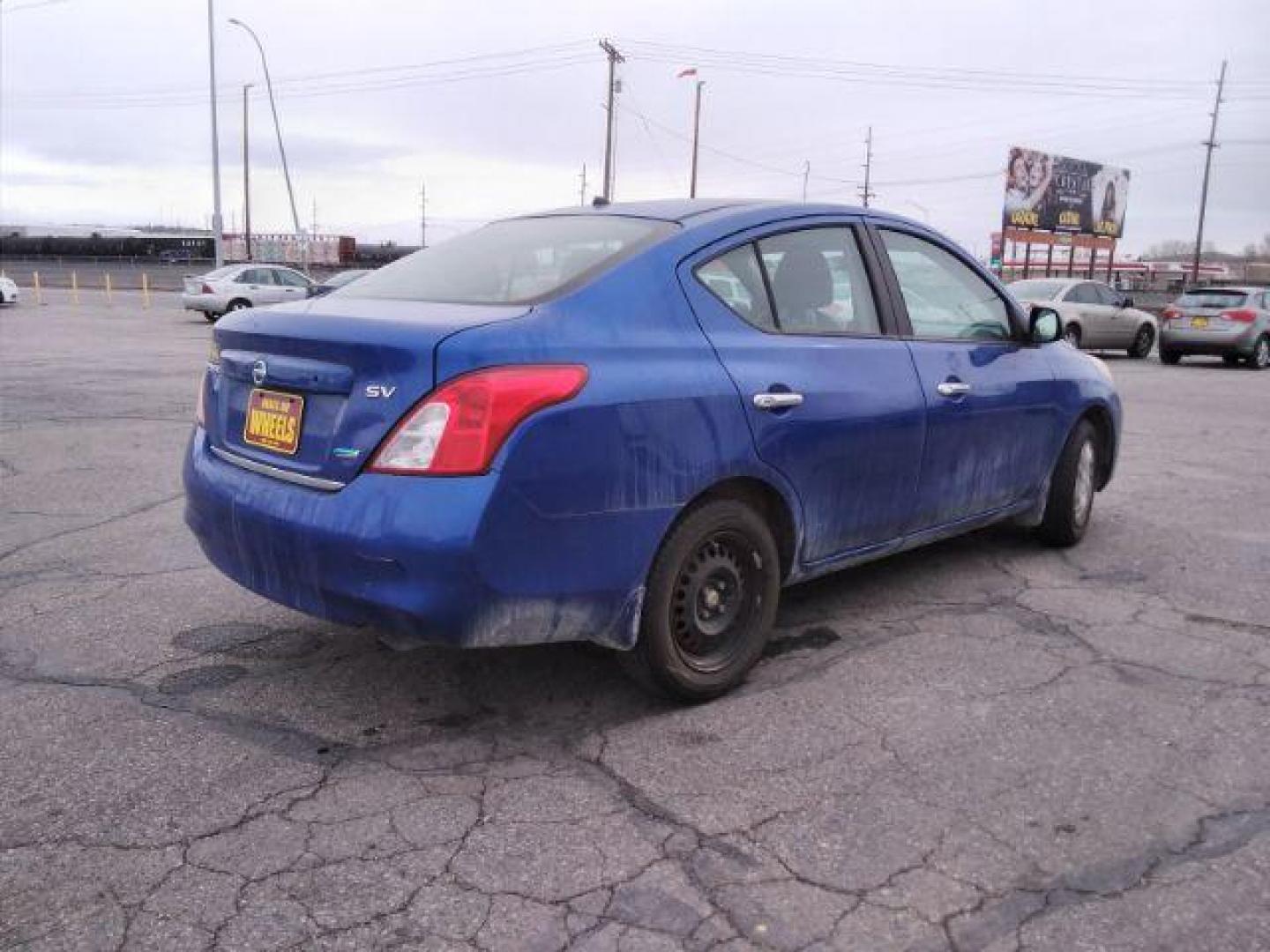 2012 Nissan Versa 1.6 SV Sedan (3N1CN7AP3CL) with an 1.6L L4 DOHC 16V engine, located at 4047 Montana Ave., Billings, MT, 59101, 45.770847, -108.529800 - Photo#5