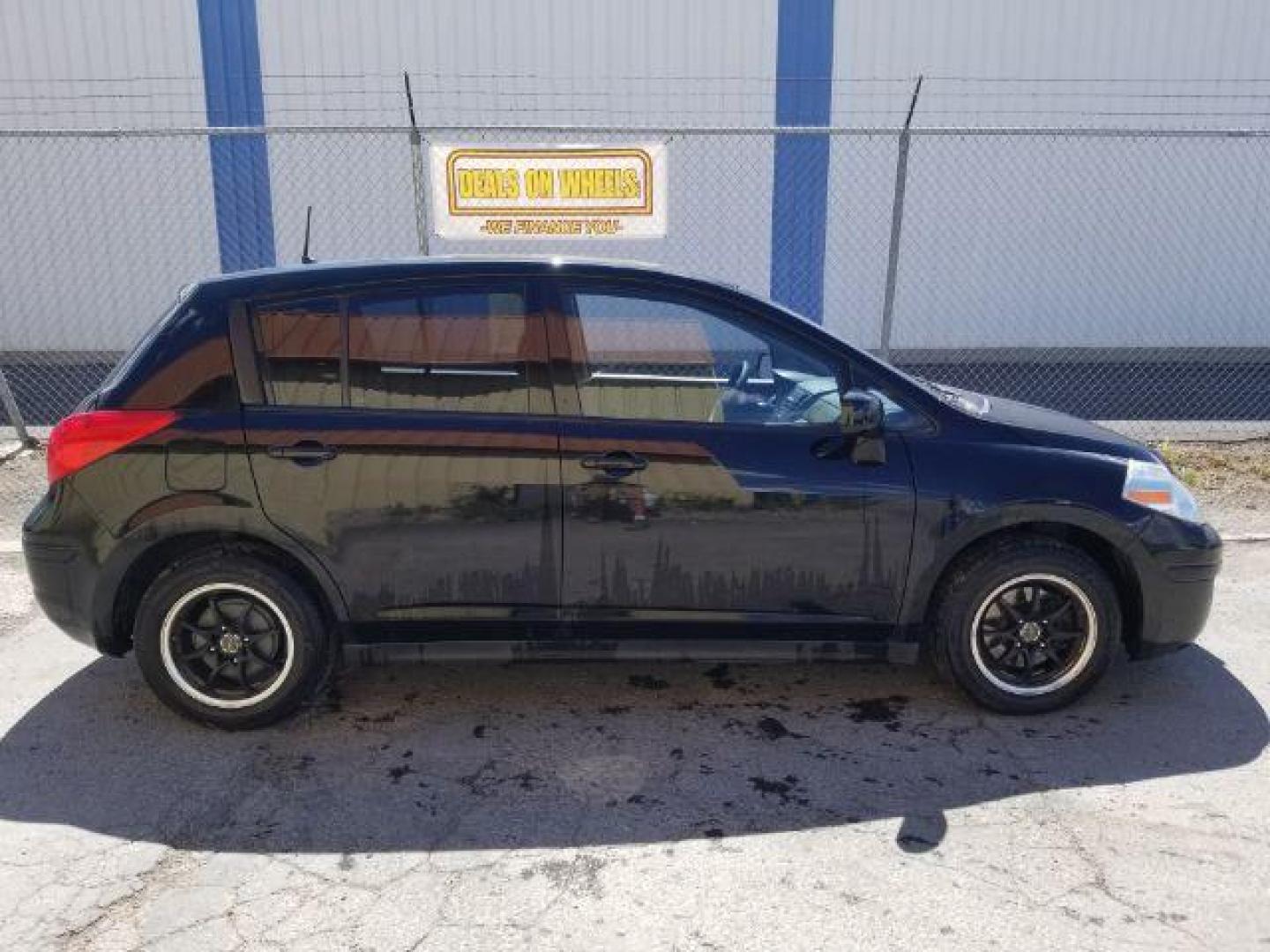 2012 Nissan Versa 1.8 SL Hatchback (3N1BC1CP7CK) with an 1.8L L4 DOHC 16V engine, Continuously Variable Transmission transmission, located at 4047 Montana Ave., Billings, MT, 59101, 45.770847, -108.529800 - Photo#5