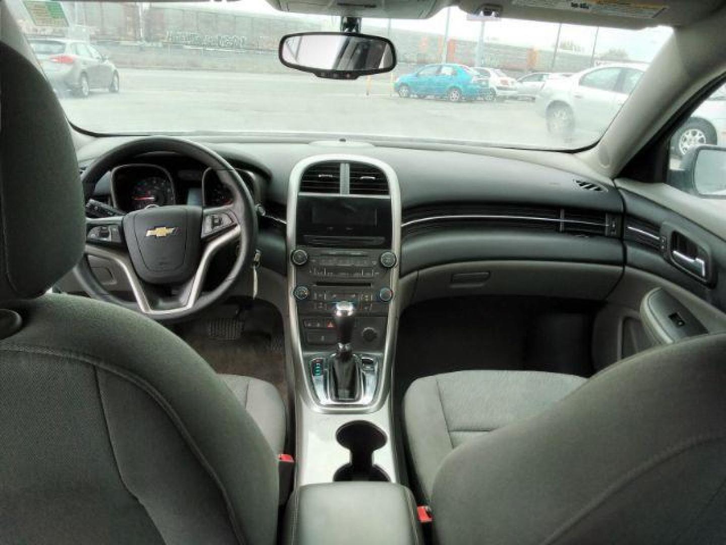 2013 Summit White Chevrolet Malibu LS (1G11B5SAXDF) with an 2.5L L4 DOHC 16V engine, 6-Speed Automatic transmission, located at 4047 Montana Ave., Billings, MT, 59101, 45.770847, -108.529800 - Photo#9