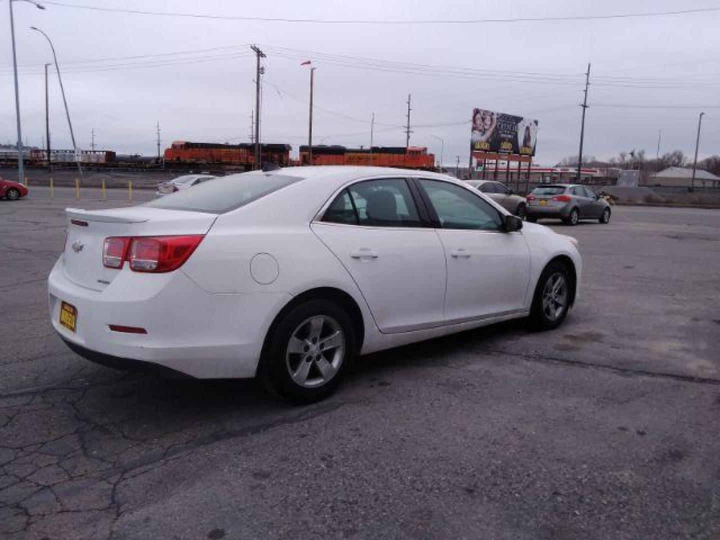 2013 Summit White Chevrolet Malibu LS (1G11B5SAXDF) with an 2.5L L4 DOHC 16V engine, 6-Speed Automatic transmission, located at 4047 Montana Ave., Billings, MT, 59101, 45.770847, -108.529800 - Photo#6