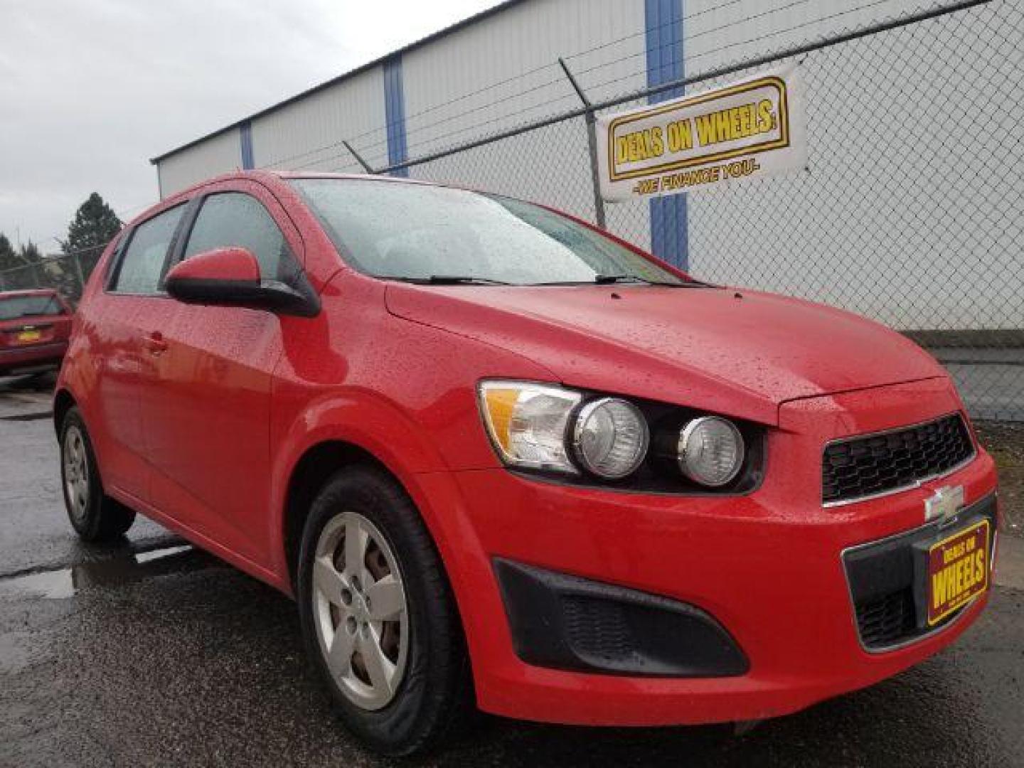 2013 Chevrolet Sonic LS Auto 5-Door (1G1JA6SH6D4) with an 1.8L L4 DOHC 24V engine, 6-Speed Automatic transmission, located at 4047 Montana Ave., Billings, MT, 59101, 45.770847, -108.529800 - Photo#2