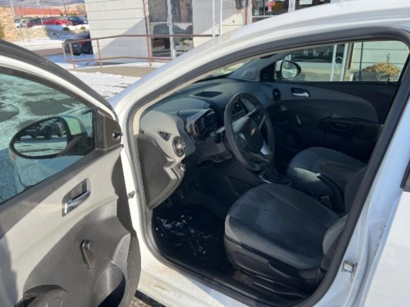 2013 Chevrolet Sonic LS Manual Sedan (1G1JB5SH9D4) with an 1.8L L4 DOHC 24V engine, 5-Speed Manual transmission, located at 4801 10th Ave S,, Great Falls, MT, 59405, (406) 564-1505, 0.000000, 0.000000 - Photo#6