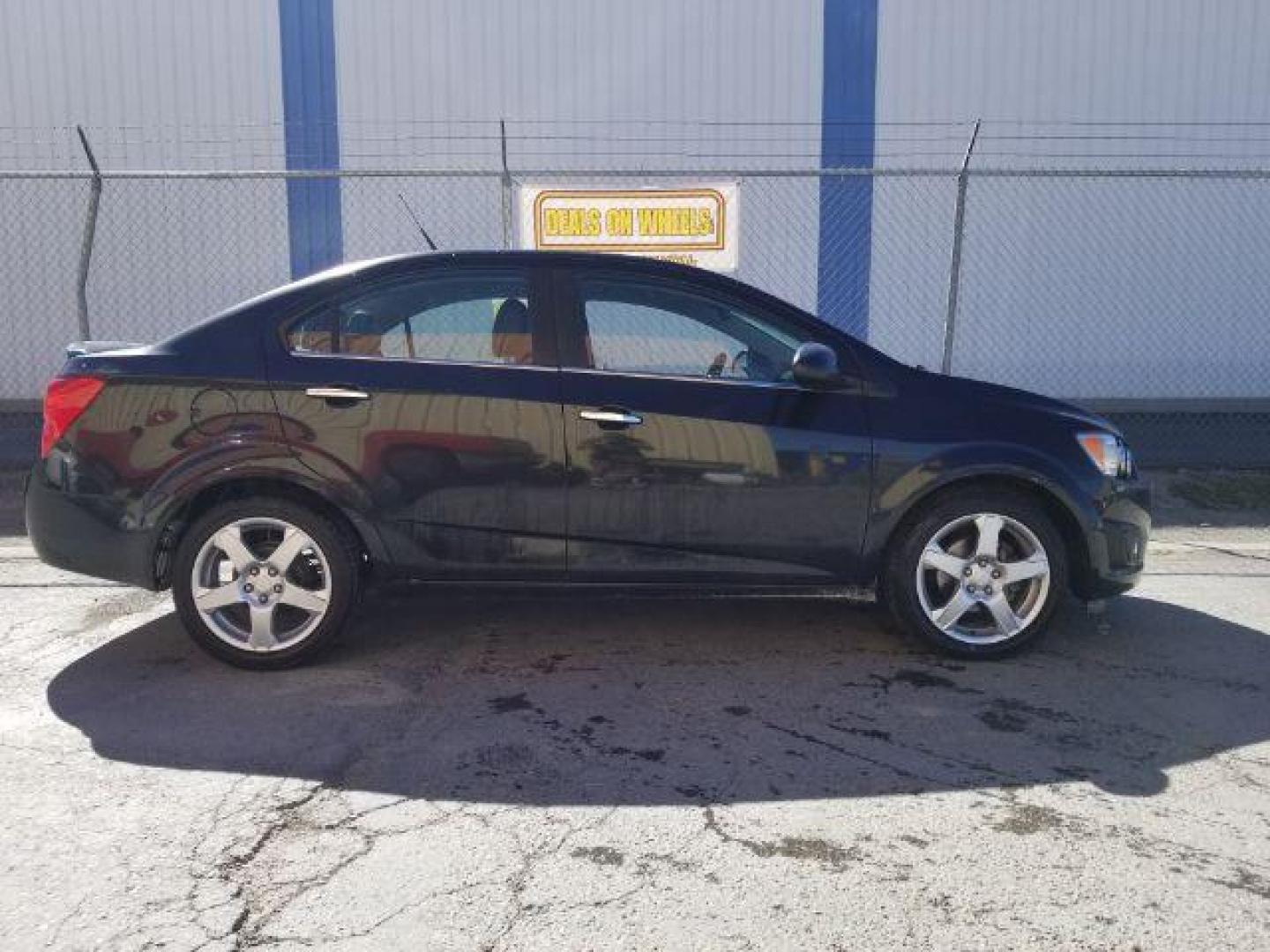 2013 Chevrolet Sonic LTZ Auto Sedan (1G1JE5SB4D4) with an 1.4L L4 DOHC 24V TUR engine, 6-Speed Automatic transmission, located at 601 E. Idaho St., Kalispell, MT, 59901, 0.000000, 0.000000 - Photo#5