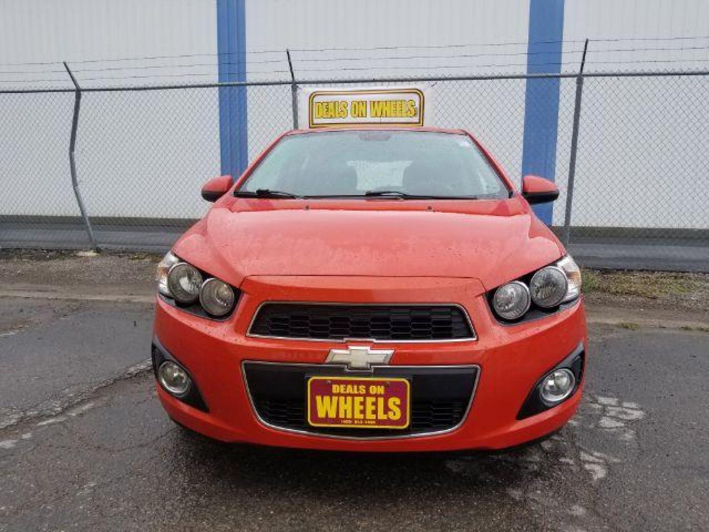 2013 Chevrolet Sonic LT Auto 5-Door (1G1JC6SH9D4) with an 1.8L L4 DOHC 24V engine, 6-Speed Automatic transmission, located at 601 E. Idaho St., Kalispell, MT, 59901, 0.000000, 0.000000 - Photo#1