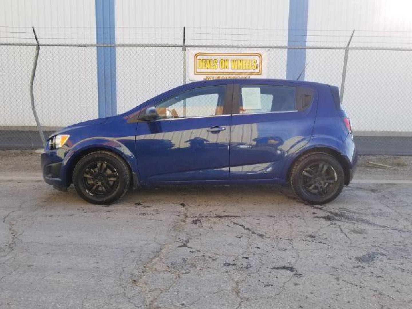 2013 Chevrolet Sonic LT Manual 5-Door (1G1JD6SB8D4) with an 1.4L L4 DOHC 24V TUR engine, 5-Speed Manual transmission, located at 1800 West Broadway, Missoula, 59808, (406) 543-1986, 46.881348, -114.023628 - Photo#2