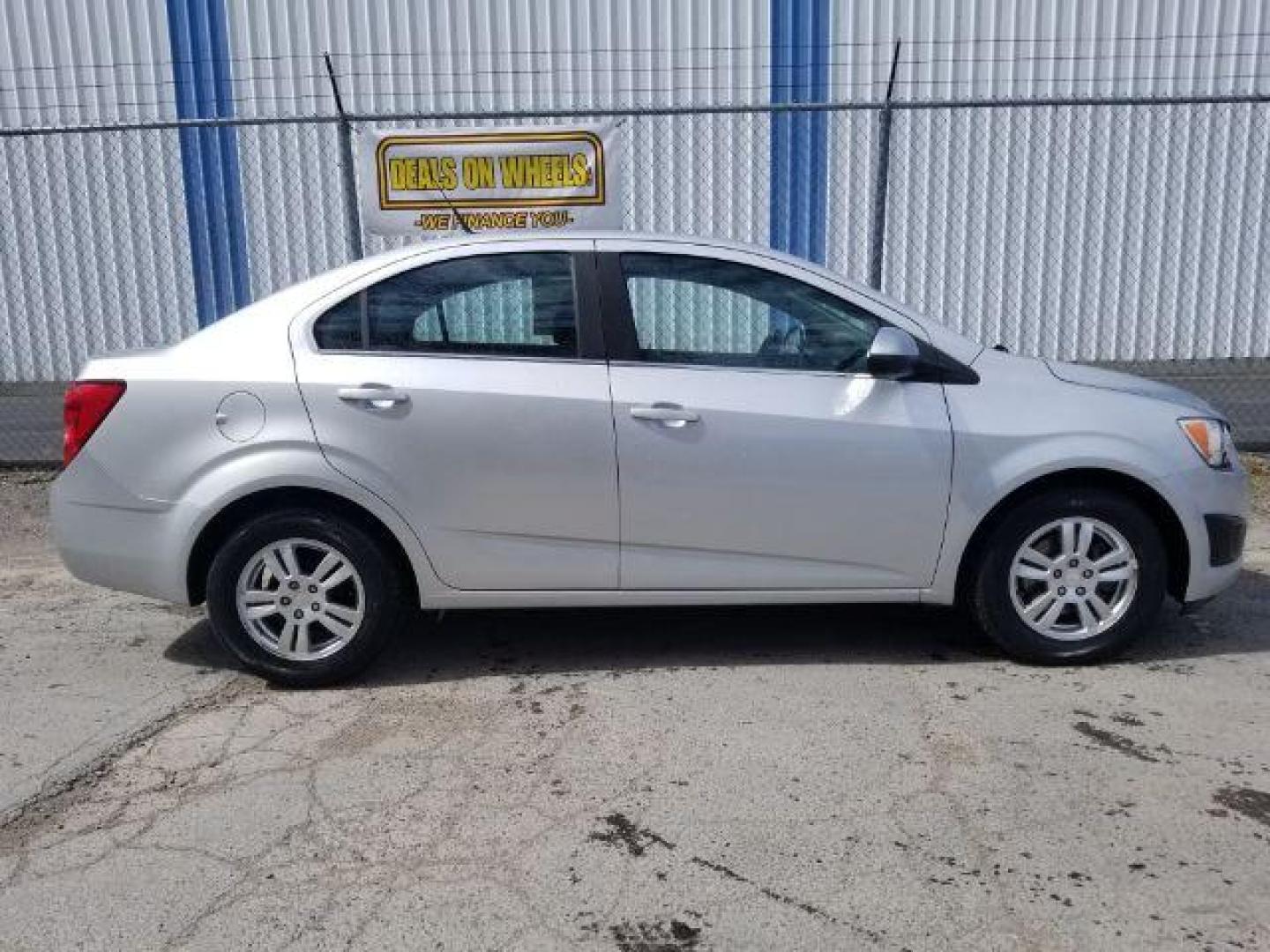 2013 Chevrolet Sonic LT Auto Sedan (1G1JC5SH9D4) with an 1.8L L4 DOHC 24V engine, 6-Speed Automatic transmission, located at 1800 West Broadway, Missoula, 59808, (406) 543-1986, 46.881348, -114.023628 - Photo#5