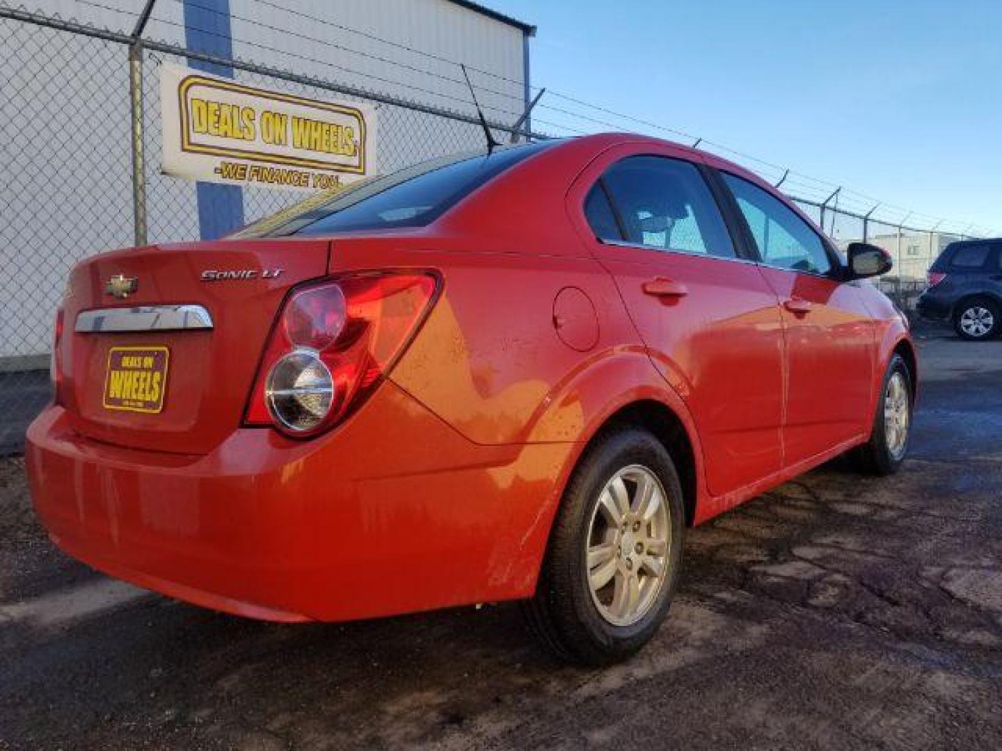 2013 Chevrolet Sonic LT Auto Sedan (1G1JC5SH5D4) with an 1.8L L4 DOHC 24V engine, 6-Speed Automatic transmission, located at 1800 West Broadway, Missoula, 59808, (406) 543-1986, 46.881348, -114.023628 - Photo#4