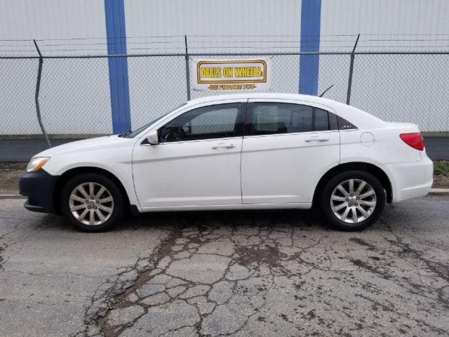 2013 Bright White Chrysler 200 Touring (1C3CCBBB4DN) with an 2.4L L4 DOHC 16V engine, 6-Speed Automatic transmission, located at 4801 10th Ave S,, Great Falls, MT, 59405, (406) 564-1505, 0.000000, 0.000000 - Photo#2