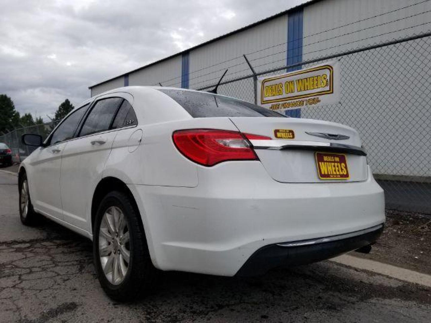 2013 Bright White Chrysler 200 Touring (1C3CCBBB4DN) with an 2.4L L4 DOHC 16V engine, 6-Speed Automatic transmission, located at 4801 10th Ave S,, Great Falls, MT, 59405, (406) 564-1505, 0.000000, 0.000000 - Photo#3