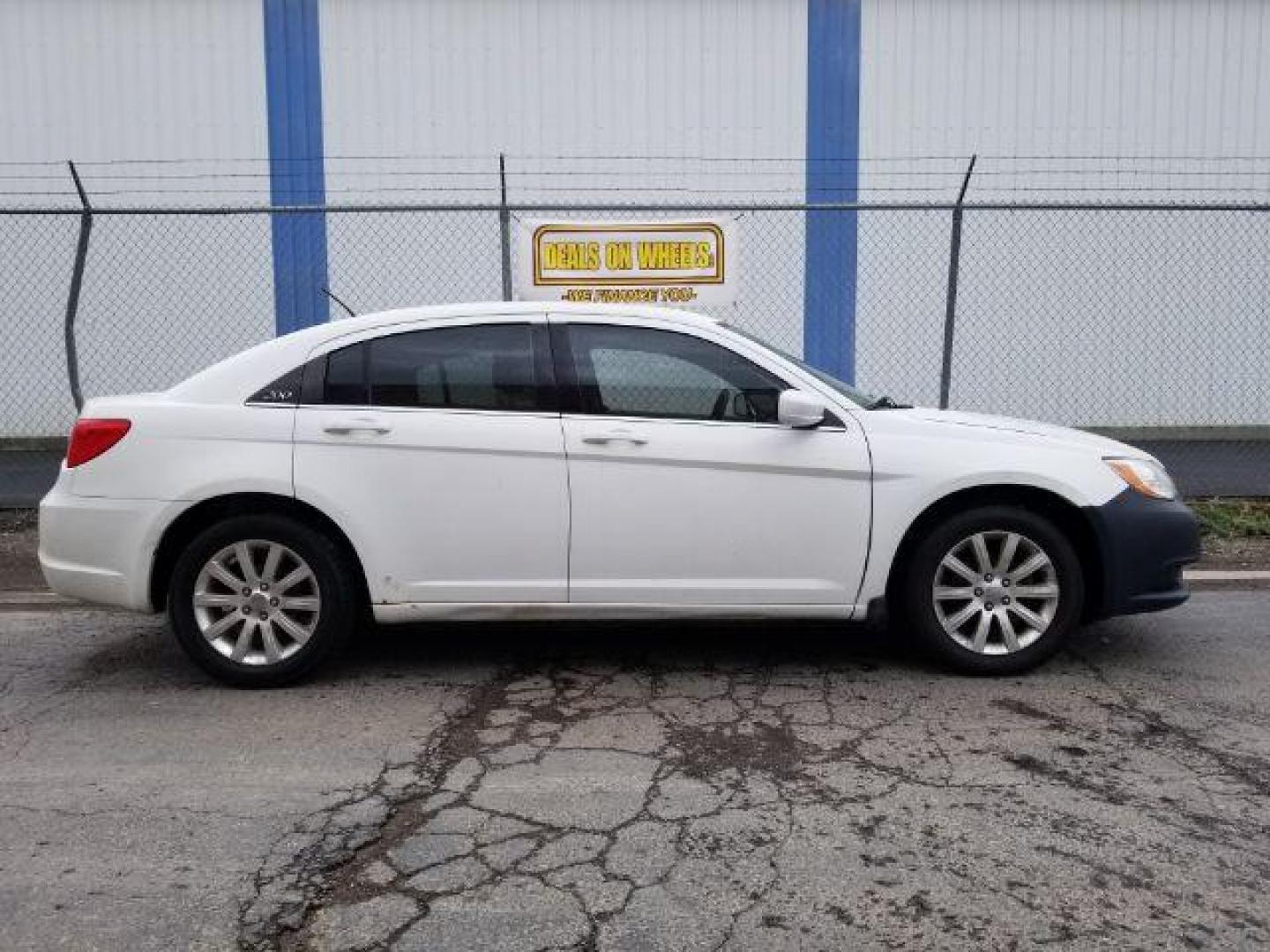 2013 Bright White Chrysler 200 Touring (1C3CCBBB4DN) with an 2.4L L4 DOHC 16V engine, 6-Speed Automatic transmission, located at 4801 10th Ave S,, Great Falls, MT, 59405, (406) 564-1505, 0.000000, 0.000000 - Photo#5