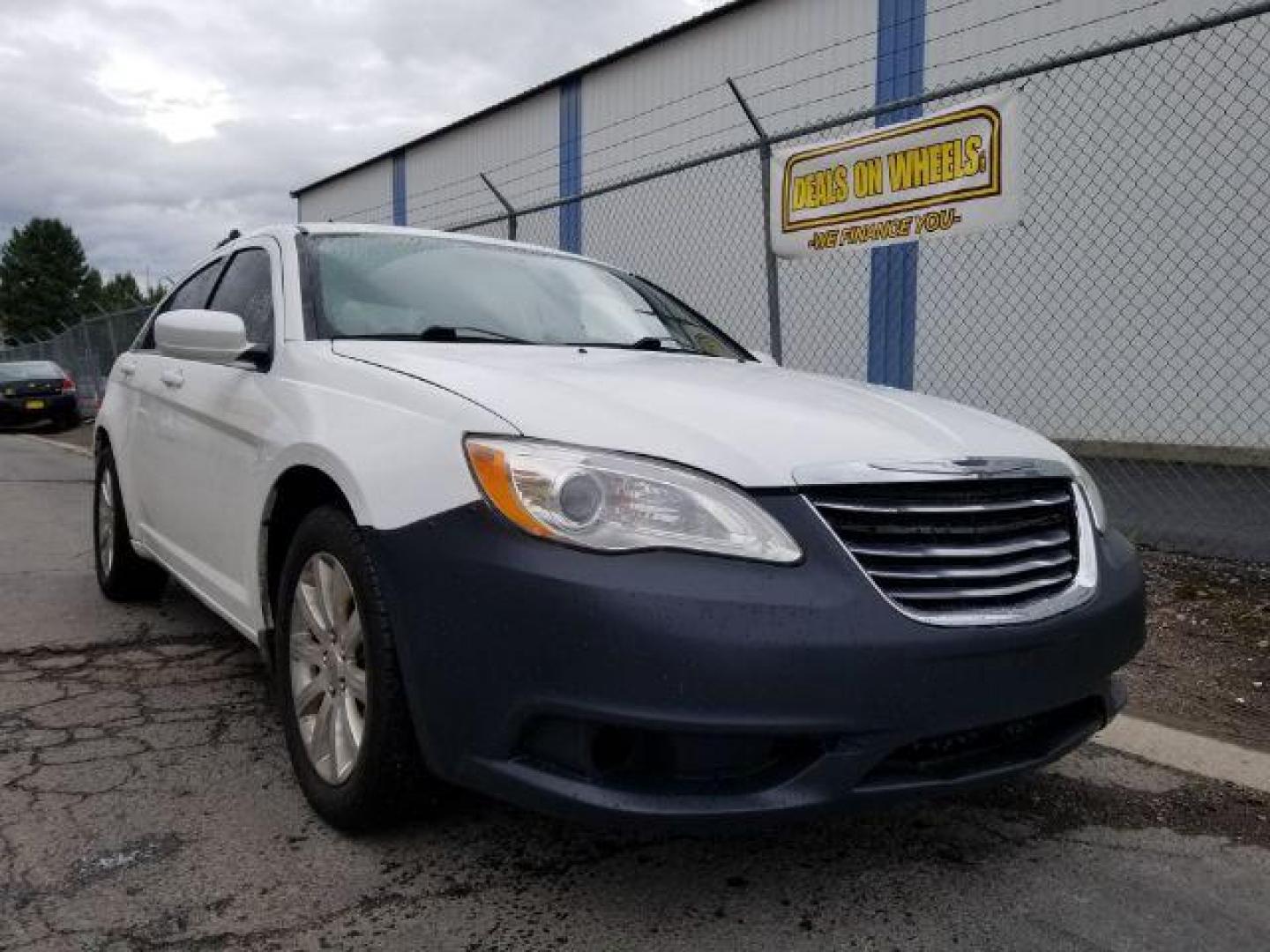 2013 Bright White Chrysler 200 Touring (1C3CCBBB4DN) with an 2.4L L4 DOHC 16V engine, 6-Speed Automatic transmission, located at 4801 10th Ave S,, Great Falls, MT, 59405, (406) 564-1505, 0.000000, 0.000000 - Photo#6