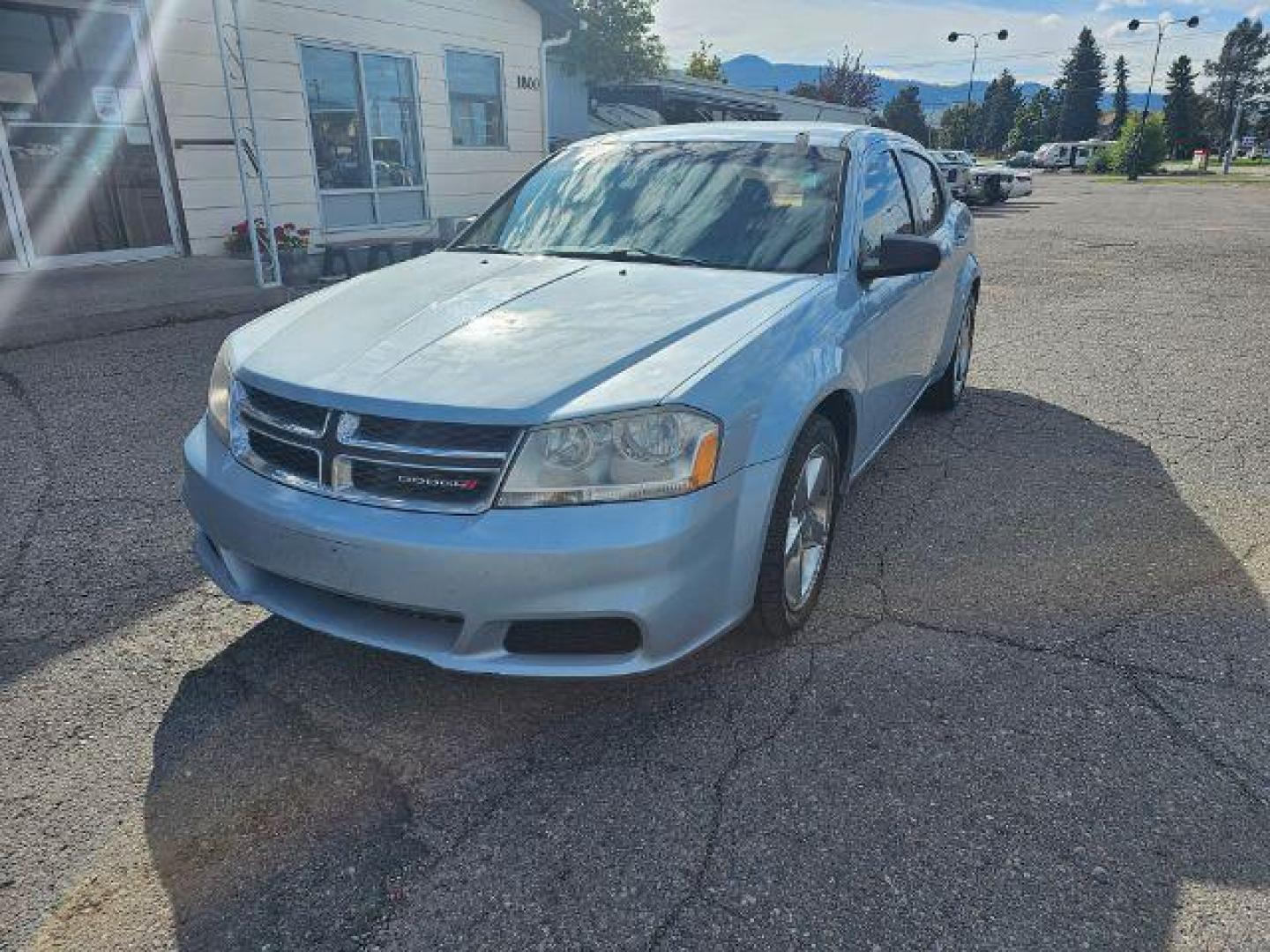 2013 Dodge Avenger Base (1C3CDZAB0DN) with an 2.4L L4 DOHC 16V engine, 4-Speed Automatic transmission, located at 4047 Montana Ave., Billings, MT, 59101, 45.770847, -108.529800 - Photo#0