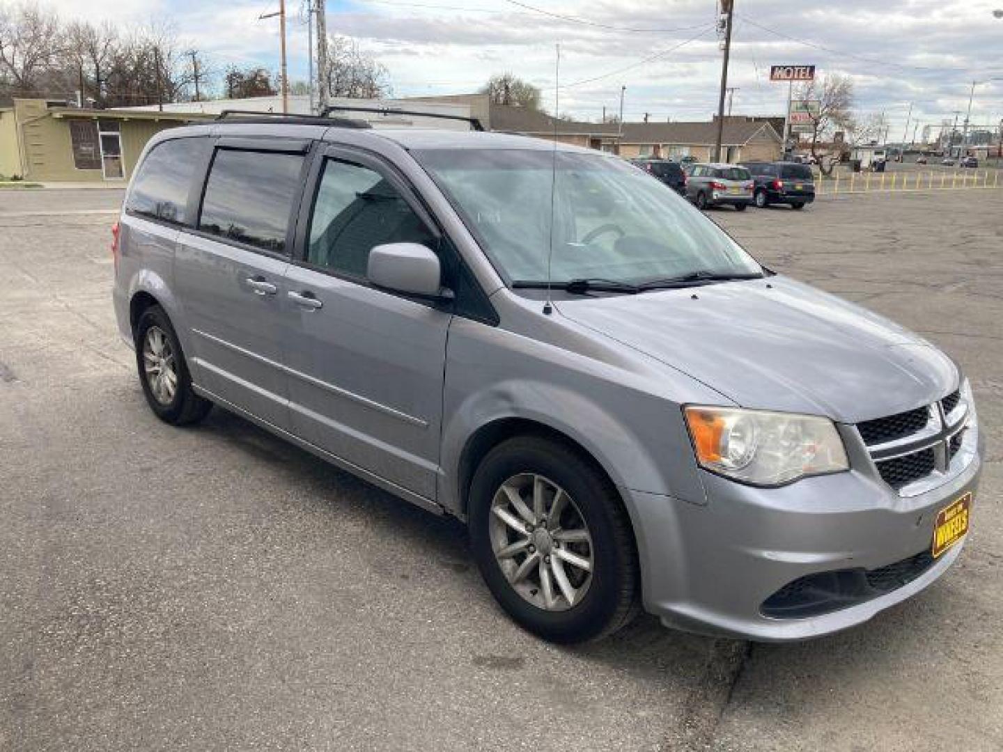 2013 Dodge Grand Caravan SXT (2C4RDGCG8DR) with an 3.6L V6 DOHC 24V engine, 6-Speed Automatic transmission, located at 4047 Montana Ave., Billings, MT, 59101, 45.770847, -108.529800 - Photo#2