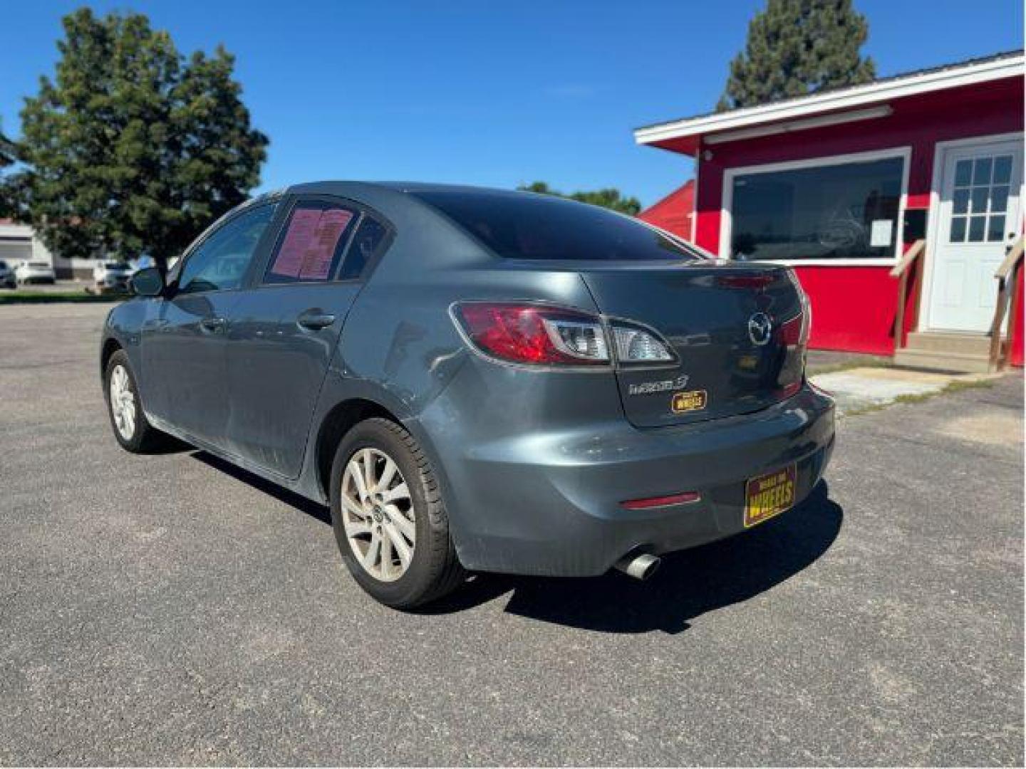 2013 Mazda MAZDA3 i SV MT 4-Door (JM1BL1TGXD1) with an 2.0L L4 DOHC 16V engine, 5-Speed Manual transmission, located at 601 E. Idaho St., Kalispell, MT, 59901, 0.000000, 0.000000 - Photo#2