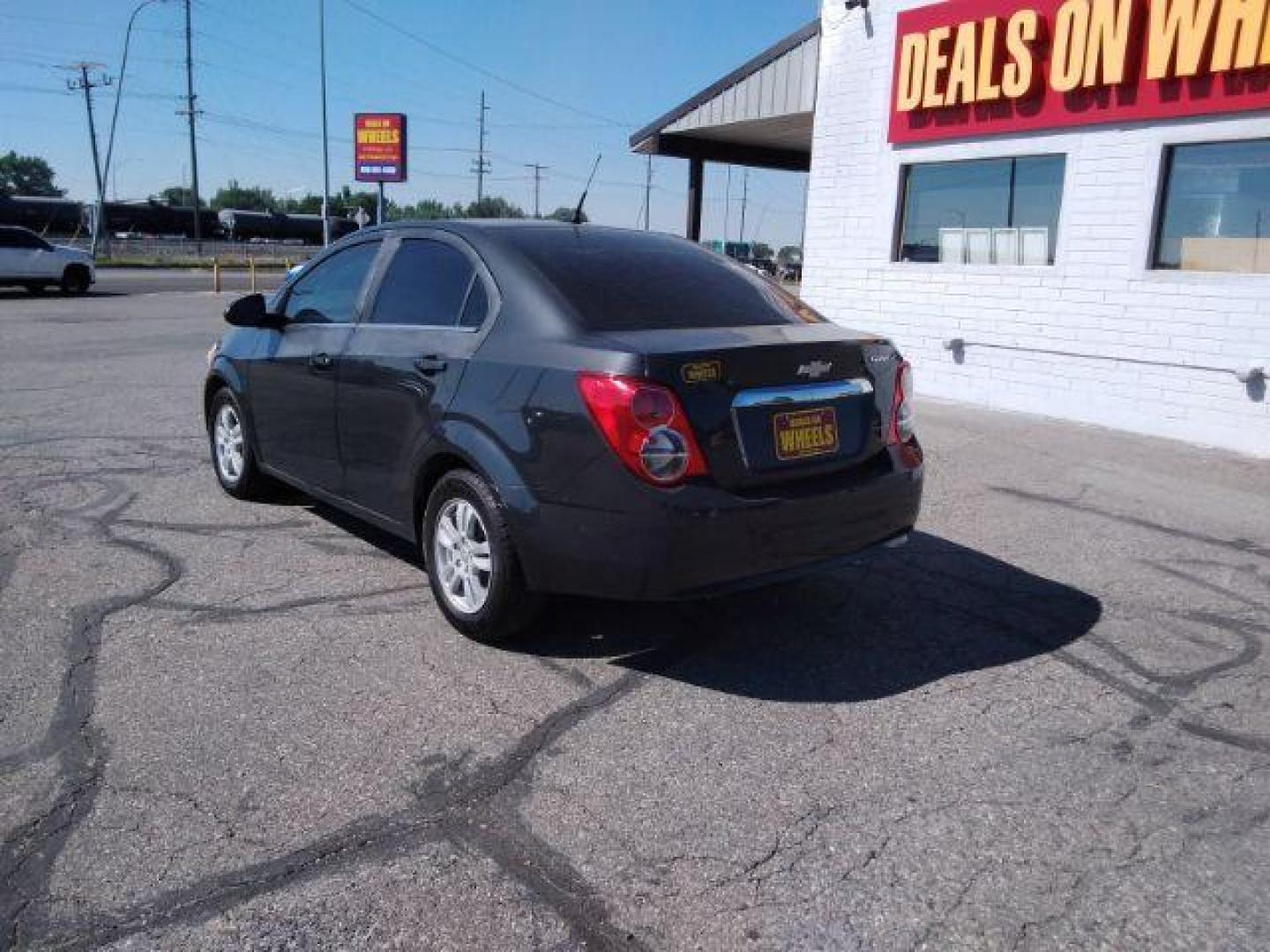 2014 Chevrolet Sonic LT Auto Sedan (1G1JC5SH9E4) with an 1.8L L4 DOHC 24V engine, 6-Speed Automatic transmission, located at 4047 Montana Ave., Billings, MT, 59101, 45.770847, -108.529800 - Photo#3