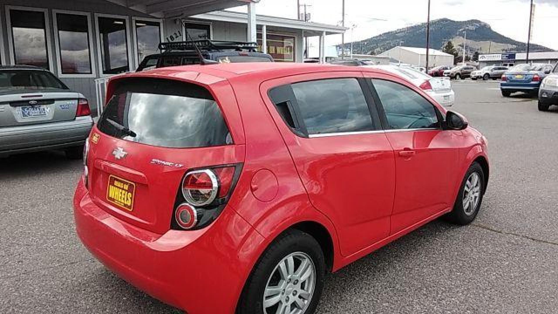 2014 Chevrolet Sonic LT Auto 5-Door (1G1JC6SH6E4) with an 1.8L L4 DOHC 24V engine, 6-Speed Automatic transmission, located at 1821 N Montana Ave., Helena, MT, 59601, 0.000000, 0.000000 - Photo#4