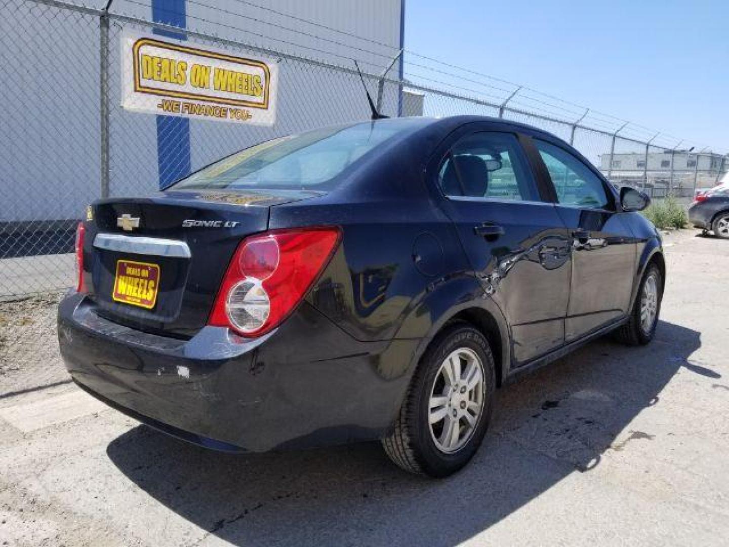 2014 Chevrolet Sonic LT Auto Sedan (1G1JC5SH7E4) with an 1.8L L4 DOHC 24V engine, 6-Speed Automatic transmission, located at 1821 N Montana Ave., Helena, MT, 59601, 0.000000, 0.000000 - Photo#11