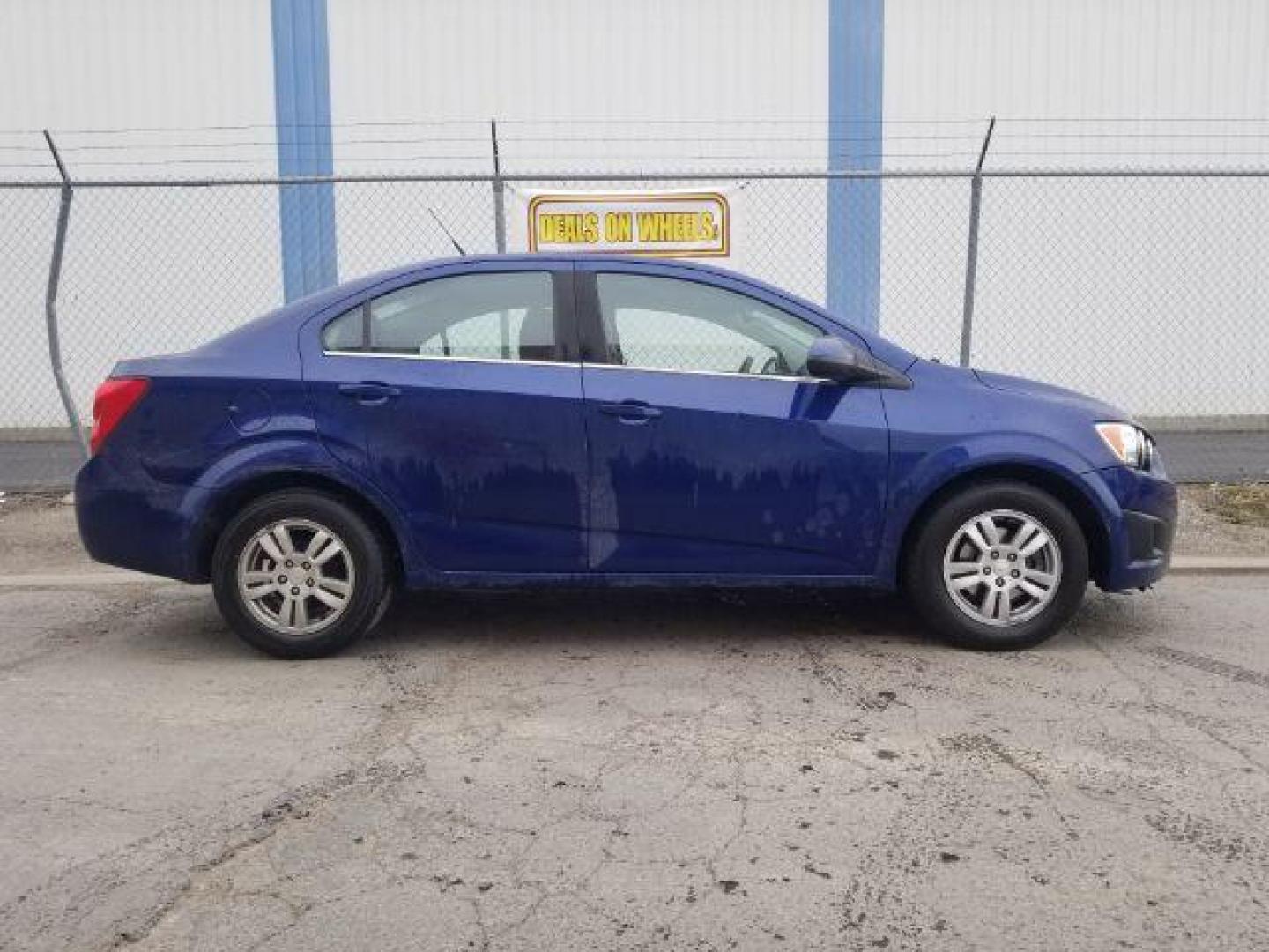 2014 Chevrolet Sonic LT Auto Sedan (1G1JC5SH7E4) with an 1.8L L4 DOHC 24V engine, 6-Speed Automatic transmission, located at 601 E. Idaho St., Kalispell, MT, 59901, 0.000000, 0.000000 - Photo#3