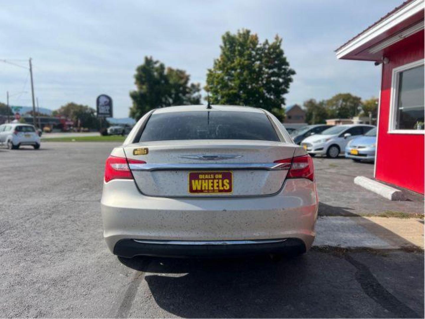 2014 Chrysler 200 LX (1C3CCBAB4EN) with an 2.4L L4 DOHC 16V engine, 6-Speed Automatic transmission, located at 601 E. Idaho St., Kalispell, MT, 59901, 0.000000, 0.000000 - Photo#3