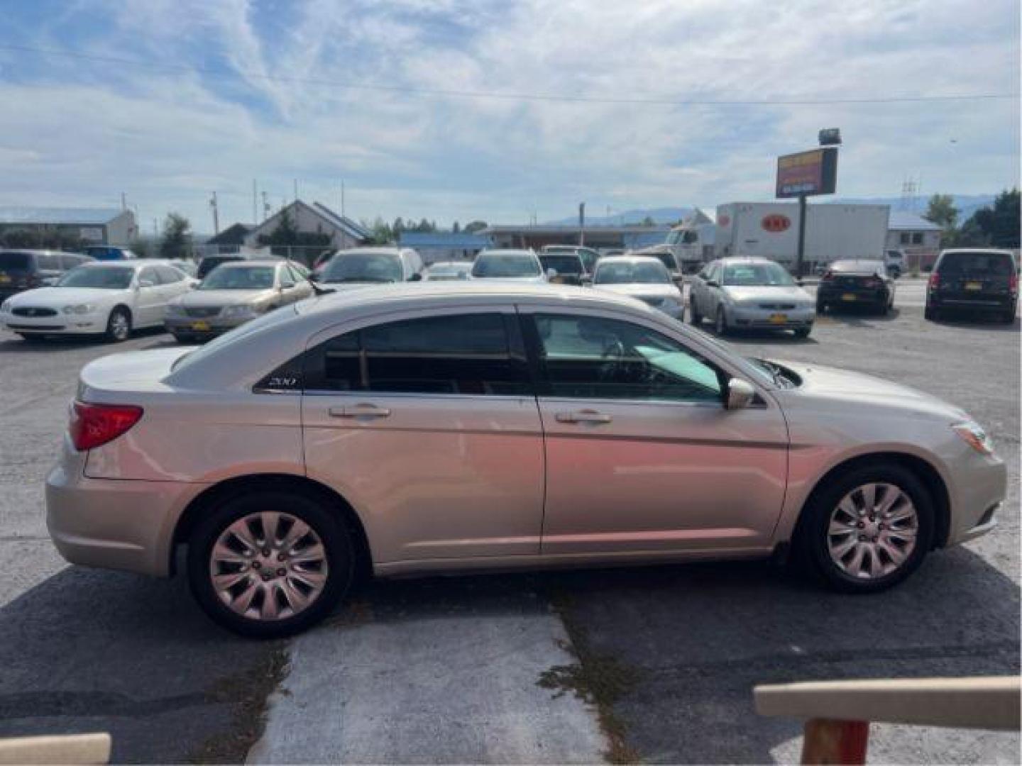 2014 Chrysler 200 LX (1C3CCBAB4EN) with an 2.4L L4 DOHC 16V engine, 6-Speed Automatic transmission, located at 601 E. Idaho St., Kalispell, MT, 59901, 0.000000, 0.000000 - Photo#5