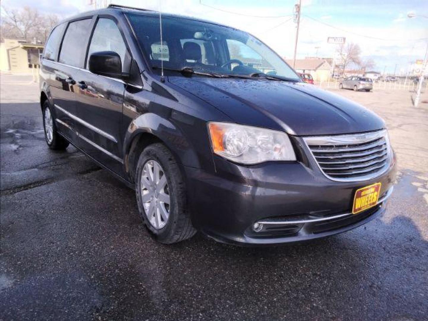 2014 Chrysler Town and Country Touring (2C4RC1BG1ER) with an 3.6L V6 DOHC 24V engine, 6-Speed Automatic transmission, located at 4047 Montana Ave., Billings, MT, 59101, 45.770847, -108.529800 - Photo#2