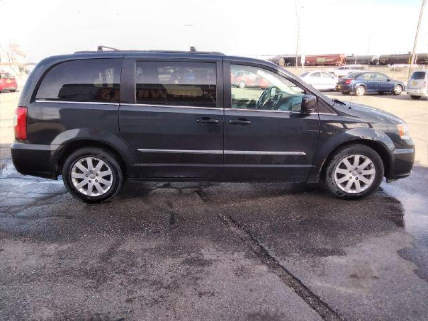 2014 Chrysler Town and Country Touring (2C4RC1BG1ER) with an 3.6L V6 DOHC 24V engine, 6-Speed Automatic transmission, located at 4047 Montana Ave., Billings, MT, 59101, 45.770847, -108.529800 - Photo#3