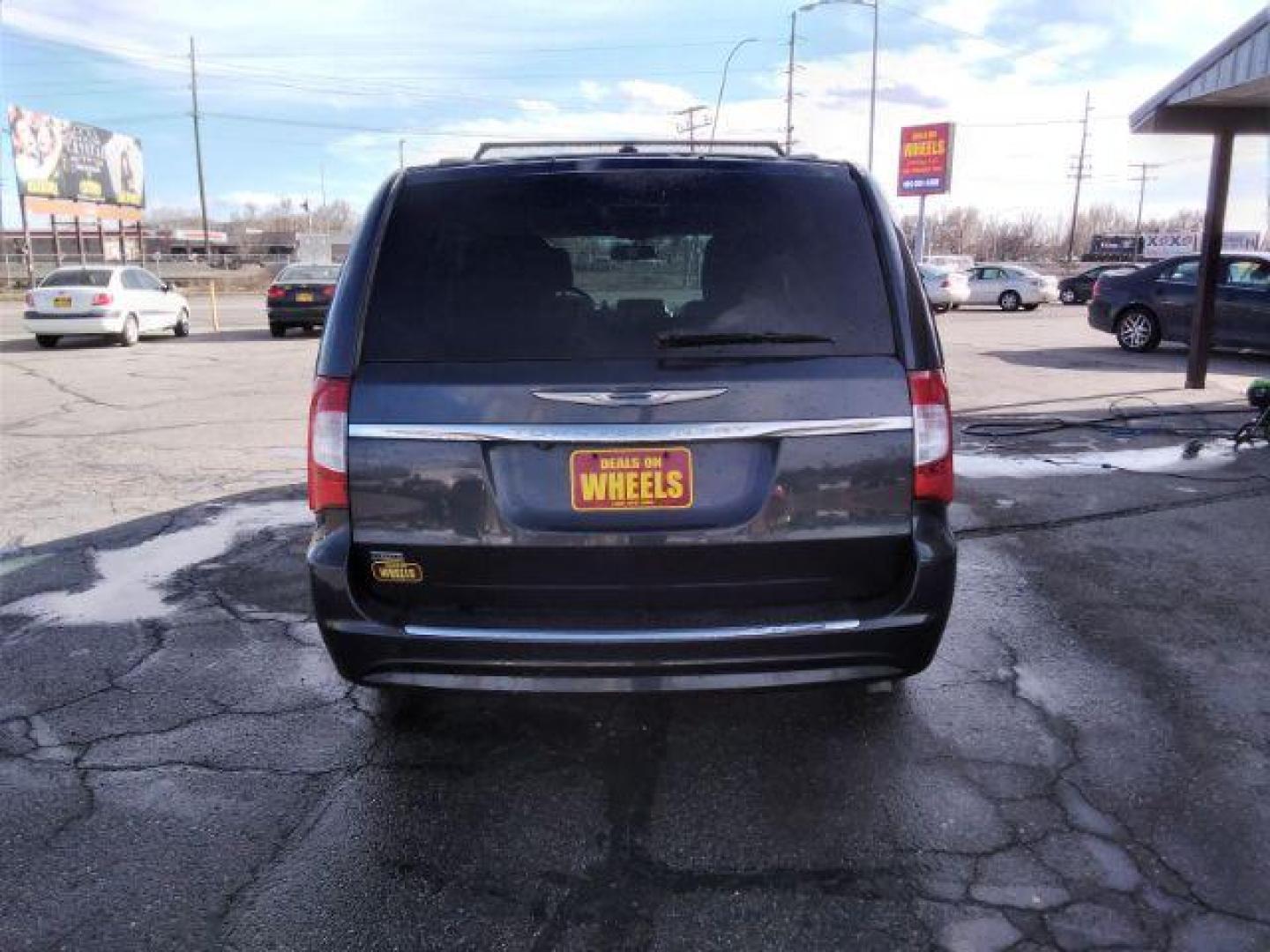 2014 Chrysler Town and Country Touring (2C4RC1BG1ER) with an 3.6L V6 DOHC 24V engine, 6-Speed Automatic transmission, located at 4047 Montana Ave., Billings, MT, 59101, 45.770847, -108.529800 - Photo#5