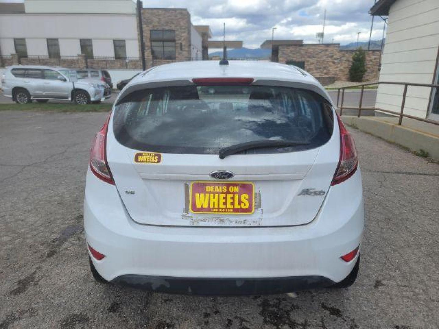 2014 Ford Fiesta SE Hatchback (3FADP4EJ6EM) with an 1.6L L4 DOHC 16V engine, 6-Speed Automatic transmission, located at 1800 West Broadway, Missoula, 59808, (406) 543-1986, 46.881348, -114.023628 - Photo#4