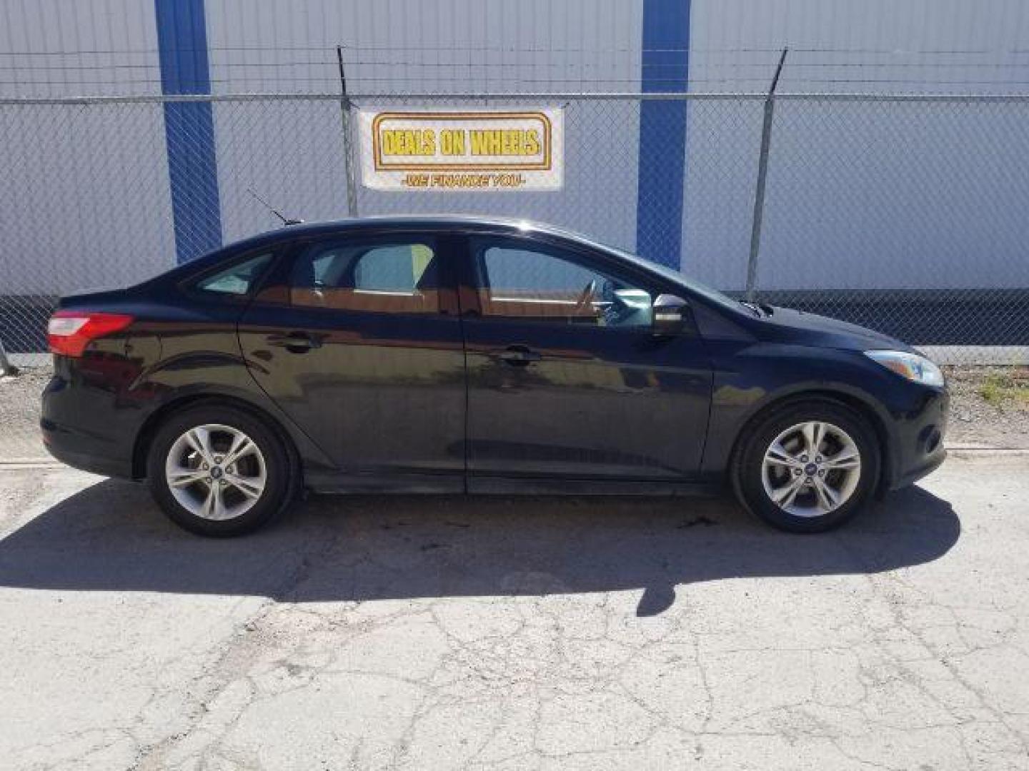 2014 Ford Focus SE Sedan (1FADP3F20EL) with an 2.0L L4 DOHC 16V engine, located at 4801 10th Ave S,, Great Falls, MT, 59405, (406) 564-1505, 0.000000, 0.000000 - Photo#9