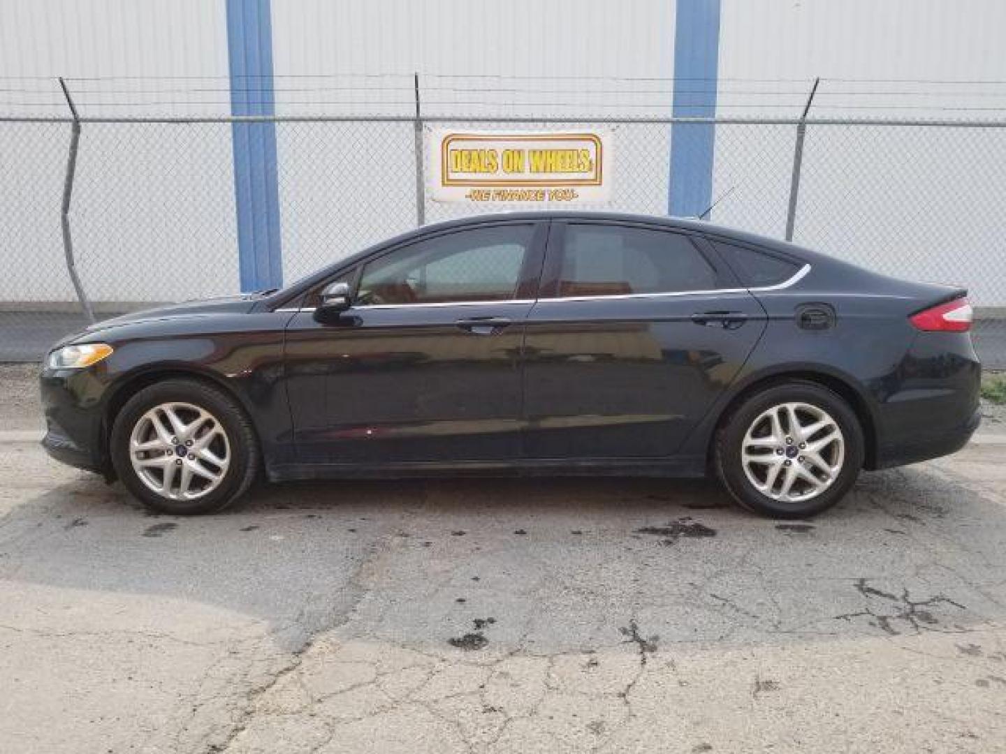 2014 Ford Fusion SE (3FA6P0H70ER) with an 2.5L L4 DOHC 16V engine, located at 4801 10th Ave S,, Great Falls, MT, 59405, (406) 564-1505, 0.000000, 0.000000 - Photo#2