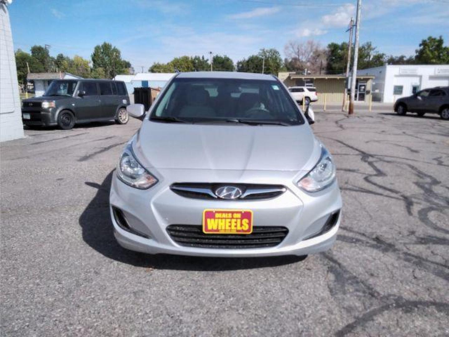 2014 Hyundai Accent GLS 4-Door (KMHCT4AE9EU) with an 1.6L L4 DOHC 16V engine, located at 4047 Montana Ave., Billings, MT, 59101, 45.770847, -108.529800 - Photo#1