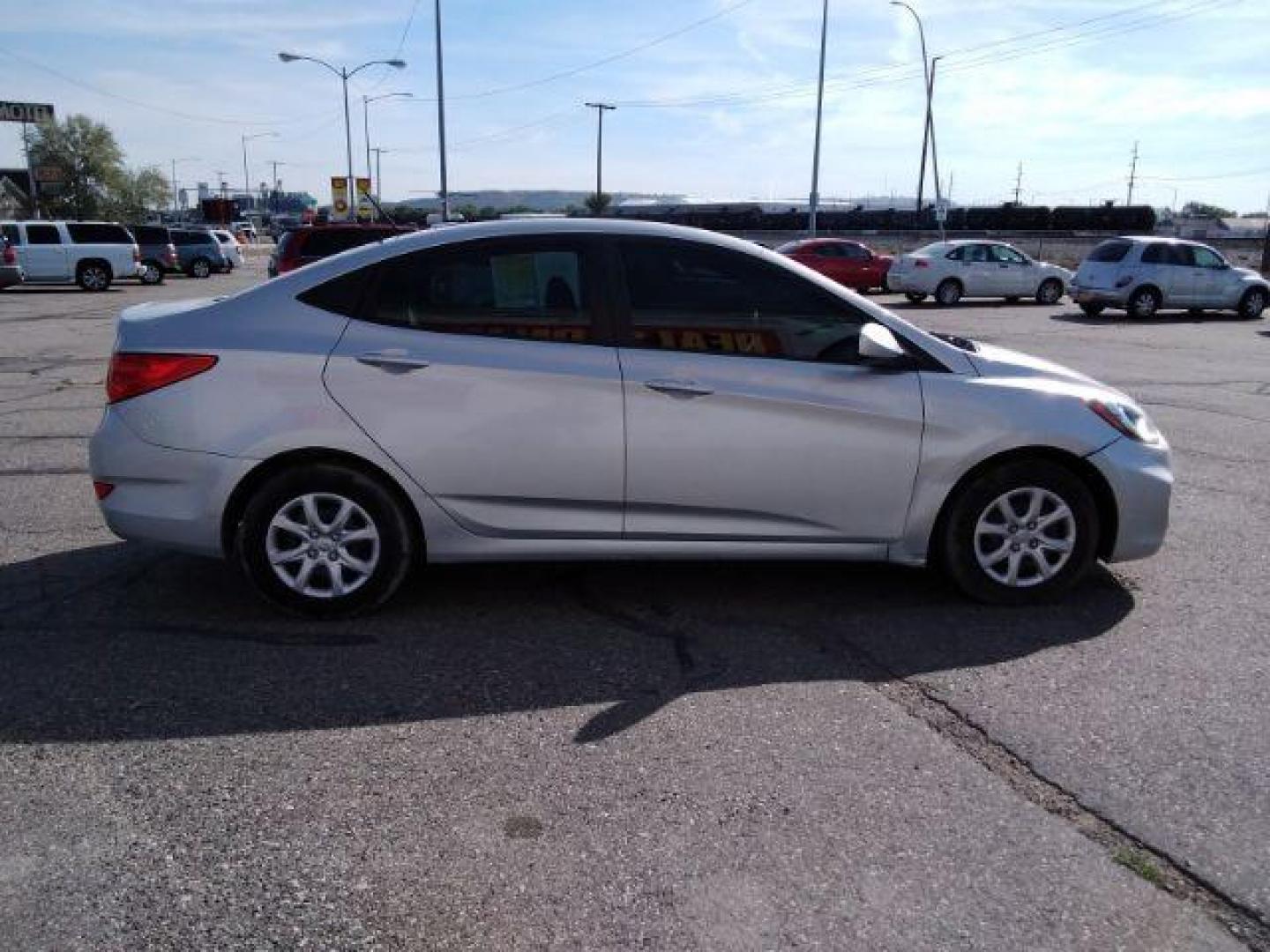 2014 Hyundai Accent GLS 4-Door (KMHCT4AE9EU) with an 1.6L L4 DOHC 16V engine, located at 4047 Montana Ave., Billings, MT, 59101, 45.770847, -108.529800 - Photo#3