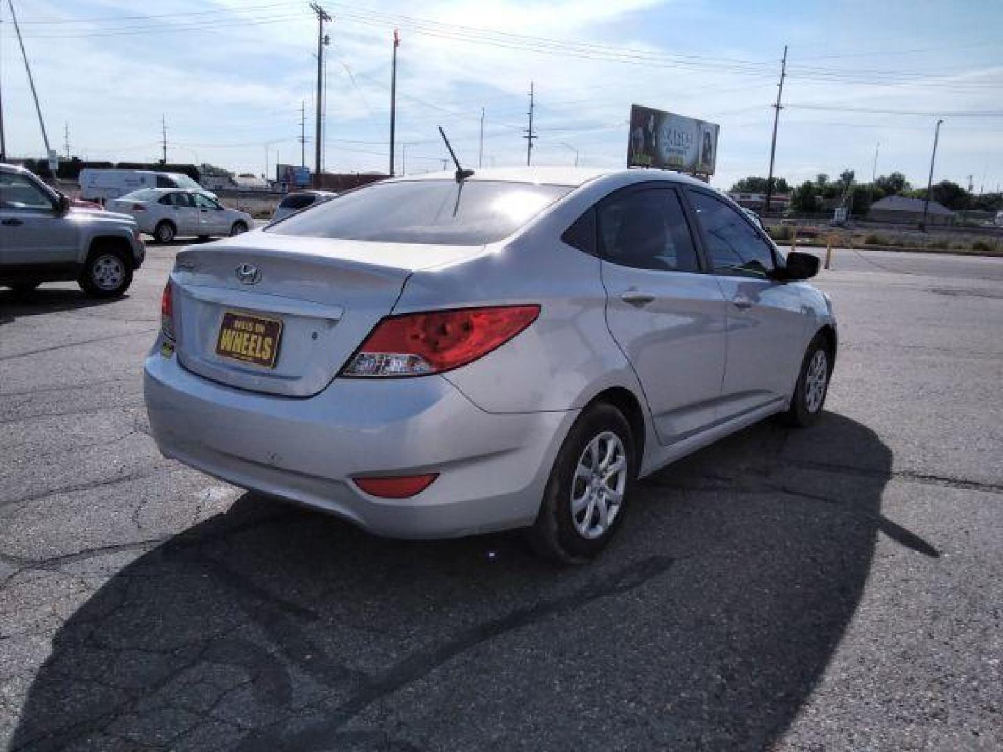 2014 Hyundai Accent GLS 4-Door (KMHCT4AE9EU) with an 1.6L L4 DOHC 16V engine, located at 4047 Montana Ave., Billings, MT, 59101, 45.770847, -108.529800 - Photo#4