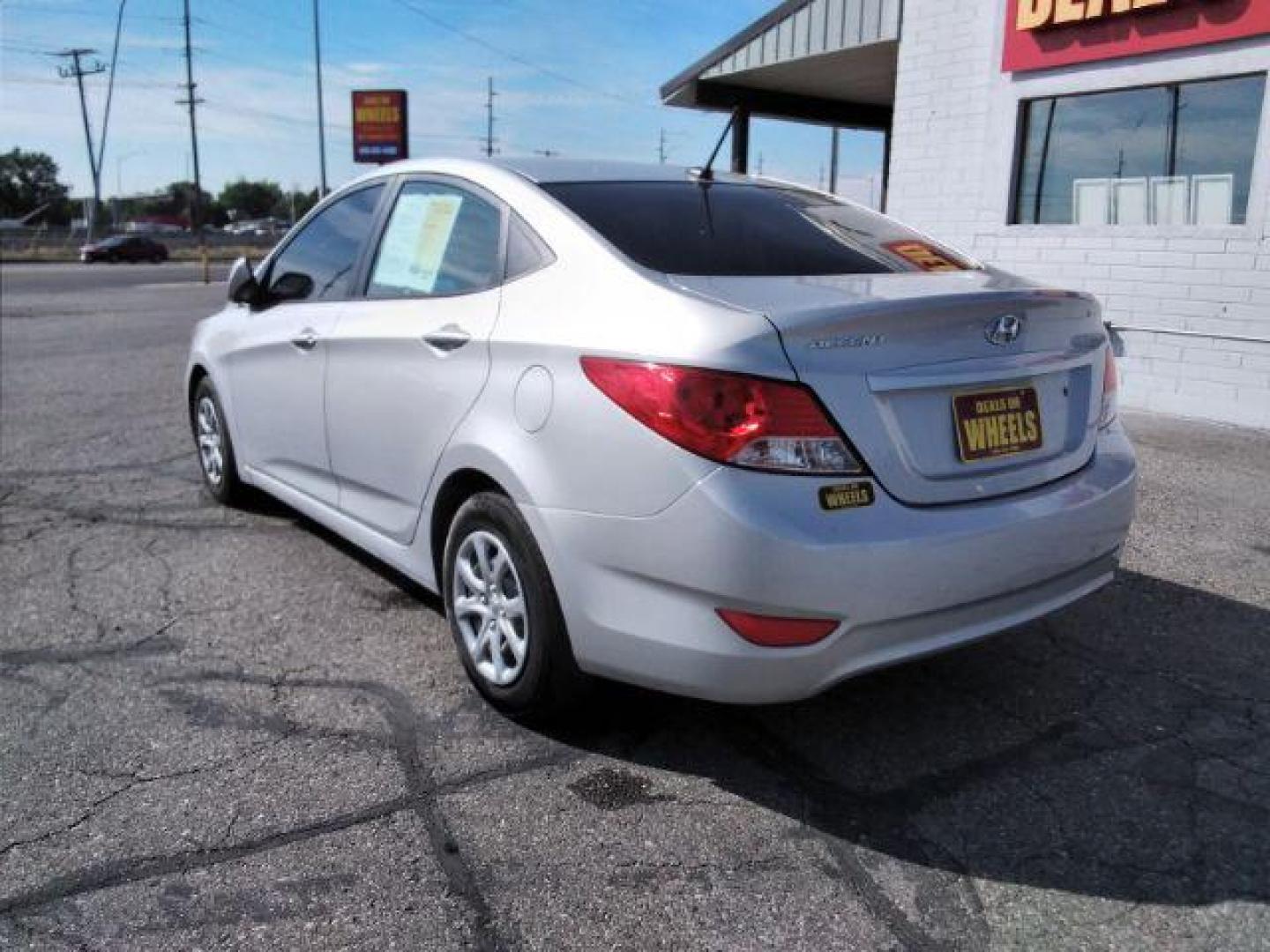 2014 Hyundai Accent GLS 4-Door (KMHCT4AE9EU) with an 1.6L L4 DOHC 16V engine, located at 4047 Montana Ave., Billings, MT, 59101, 45.770847, -108.529800 - Photo#5