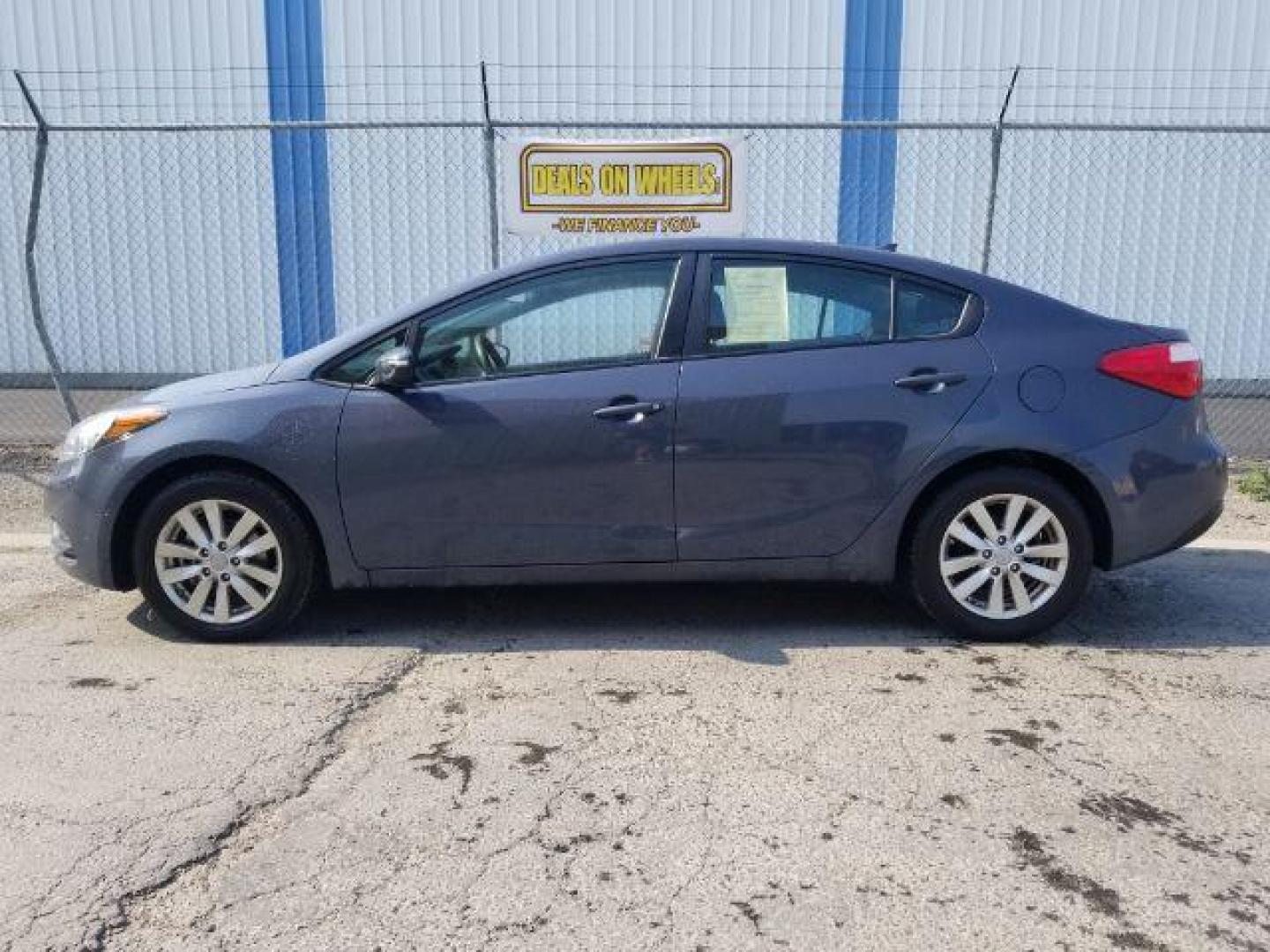 2014 Kia Forte EX (KNAFX4A66E5) with an 1.8L L4 DOHC 16V engine, 6-Speed Automatic transmission, located at 4047 Montana Ave., Billings, MT, 59101, 45.770847, -108.529800 - Photo#2