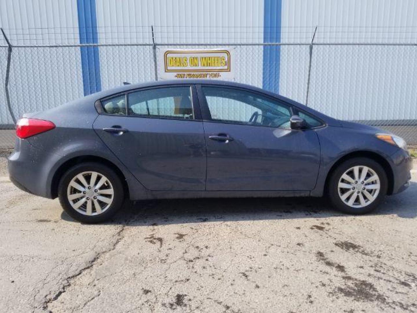 2014 Kia Forte EX (KNAFX4A66E5) with an 1.8L L4 DOHC 16V engine, 6-Speed Automatic transmission, located at 4047 Montana Ave., Billings, MT, 59101, 45.770847, -108.529800 - Photo#5