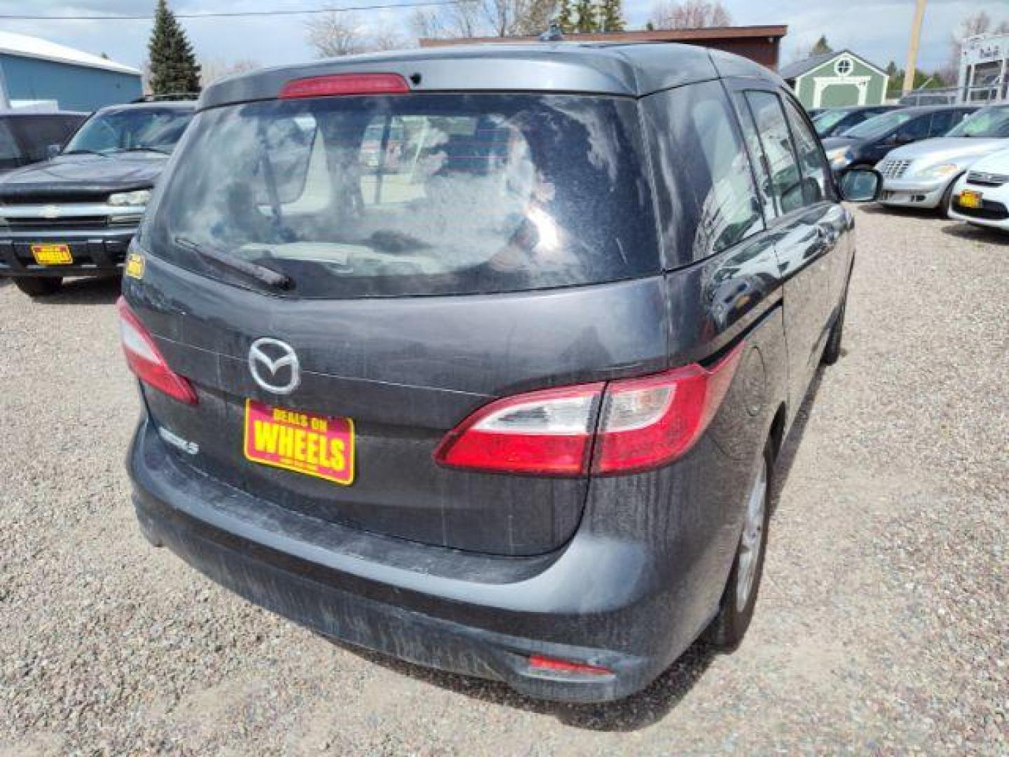 2014 Mazda MAZDA5 Sport AT (JM1CW2BL5E0) with an 2.5L L4 DOHC 16V engine, 5-Speed Automatic transmission, located at 4801 10th Ave S,, Great Falls, MT, 59405, (406) 564-1505, 0.000000, 0.000000 - Photo#4