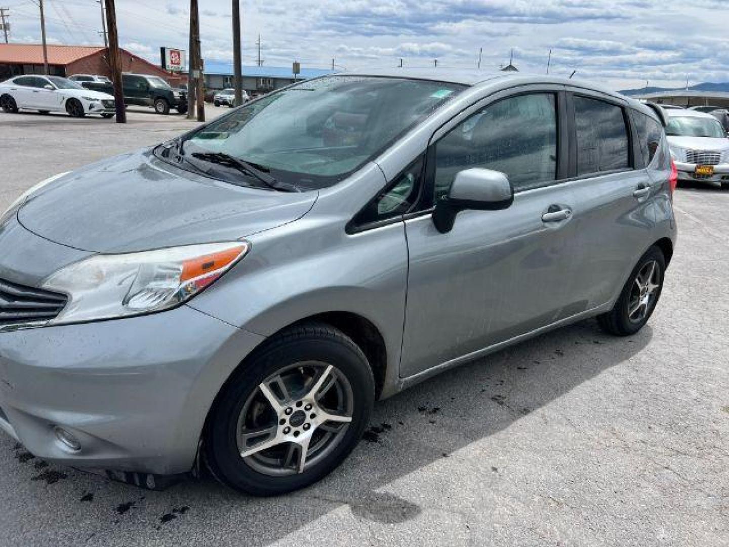 2014 Nissan Versa Note S (3N1CE2CPXEL) with an 1.6L L4 DOHC 16V engine, 5-Speed Manual transmission, located at 601 E. Idaho St., Kalispell, MT, 59901, 0.000000, 0.000000 - Photo#0