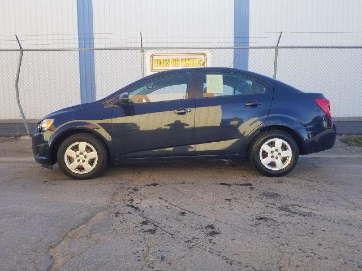 2015 Chevrolet Sonic LS Auto Sedan (1G1JA5SH5F4) with an 1.8L L4 DOHC 24V engine, 6-Speed Automatic transmission, located at 4047 Montana Ave., Billings, MT, 59101, 45.770847, -108.529800 - Photo#6