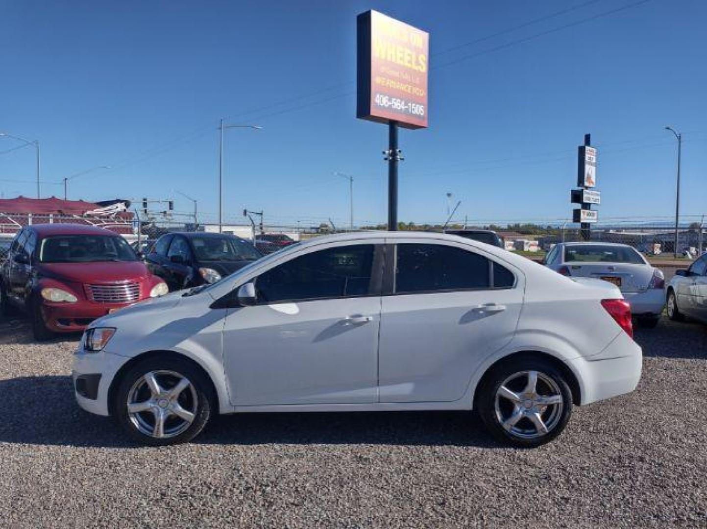 2015 Chevrolet Sonic LS Auto Sedan (1G1JA5SG2F4) with an 1.8L L4 DOHC 24V engine, 6-Speed Automatic transmission, located at 4801 10th Ave S,, Great Falls, MT, 59405, (406) 564-1505, 0.000000, 0.000000 - Photo#1