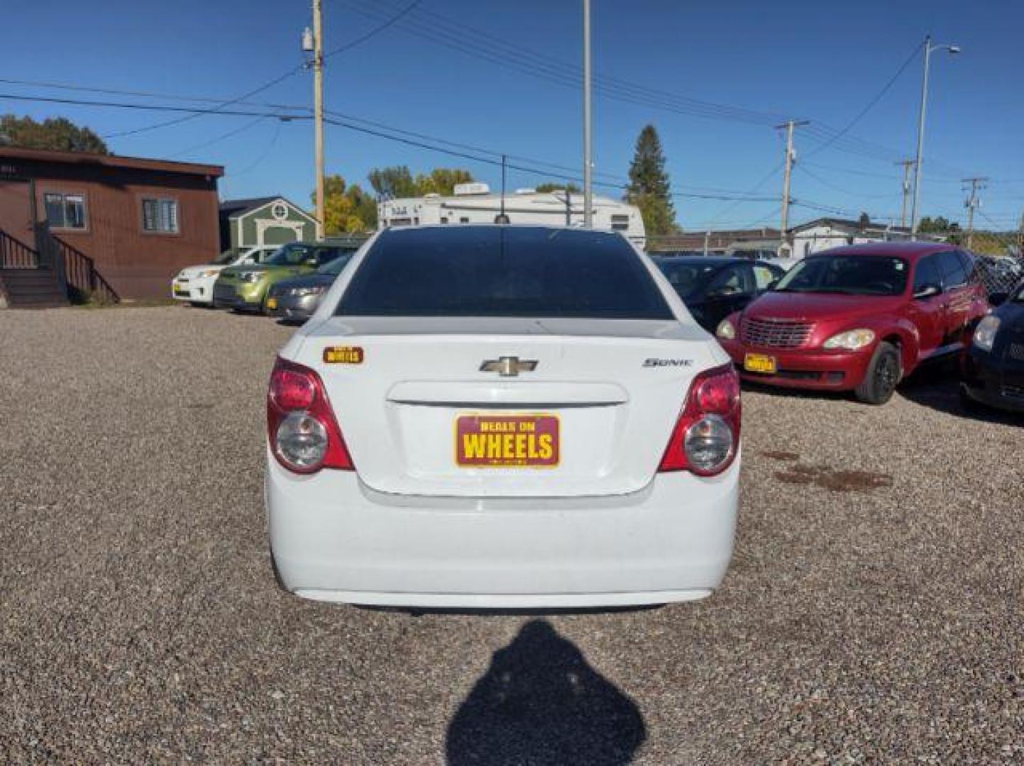 2015 Chevrolet Sonic LS Auto Sedan (1G1JA5SG2F4) with an 1.8L L4 DOHC 24V engine, 6-Speed Automatic transmission, located at 4801 10th Ave S,, Great Falls, MT, 59405, (406) 564-1505, 0.000000, 0.000000 - Photo#3