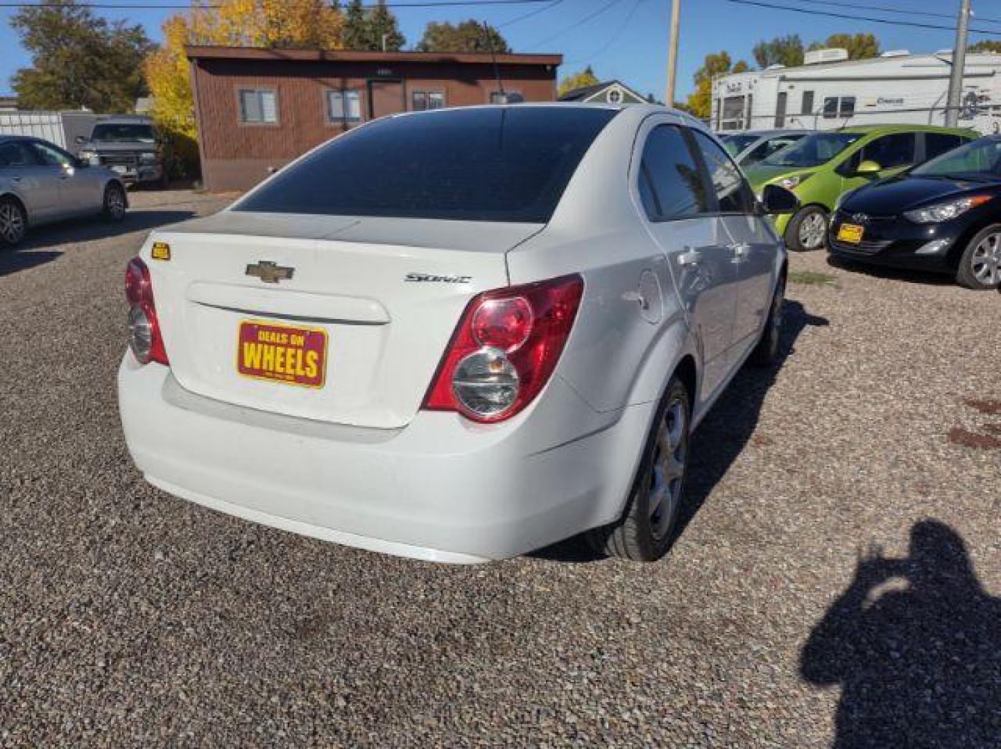 2015 Chevrolet Sonic LS Auto Sedan (1G1JA5SG2F4) with an 1.8L L4 DOHC 24V engine, 6-Speed Automatic transmission, located at 4801 10th Ave S,, Great Falls, MT, 59405, (406) 564-1505, 0.000000, 0.000000 - Photo#4