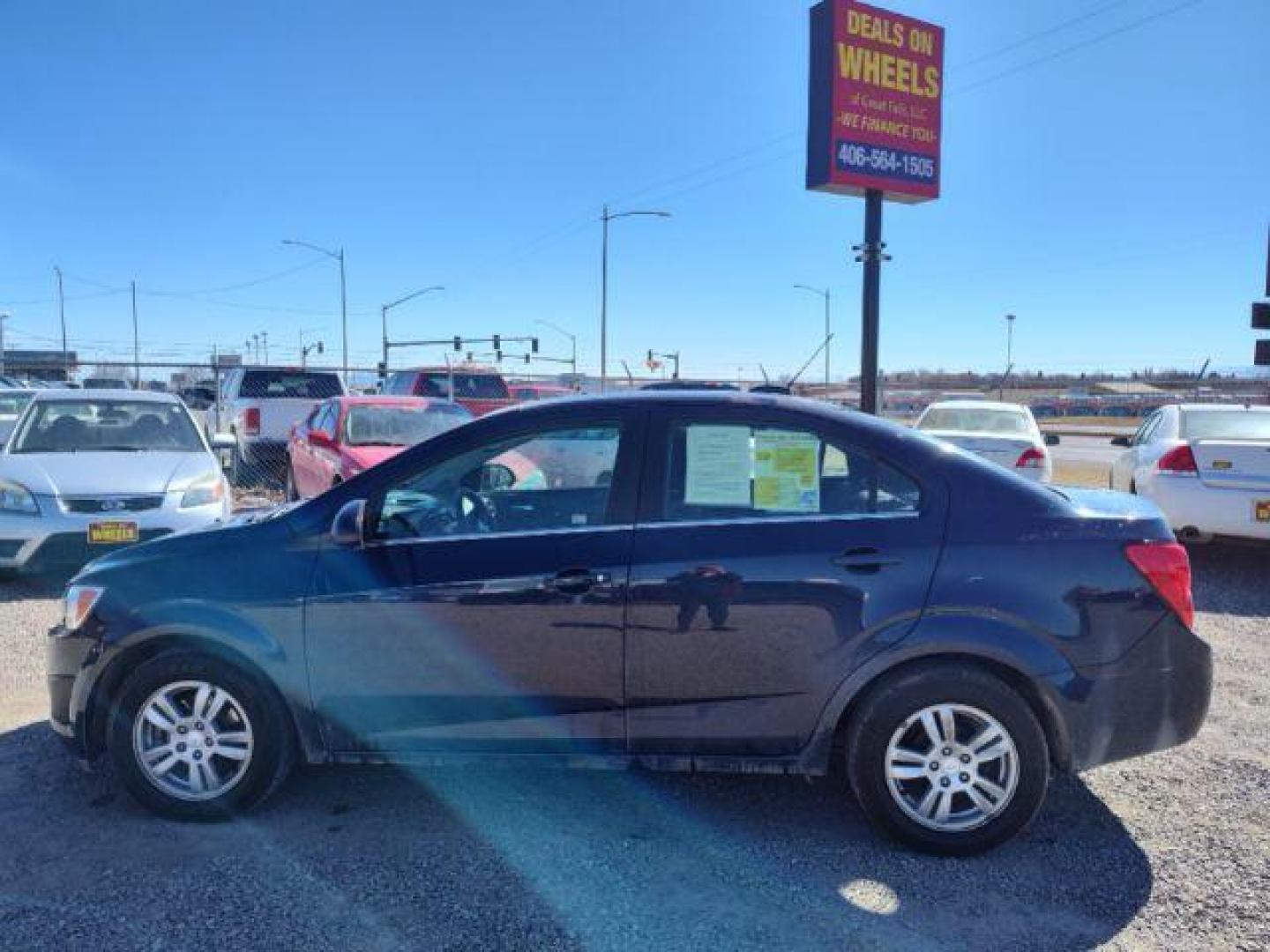 2015 Chevrolet Sonic LT Auto Sedan (1G1JC5SHXF4) with an 1.8L L4 DOHC 24V engine, 6-Speed Automatic transmission, located at 4801 10th Ave S,, Great Falls, MT, 59405, (406) 564-1505, 0.000000, 0.000000 - Photo#1