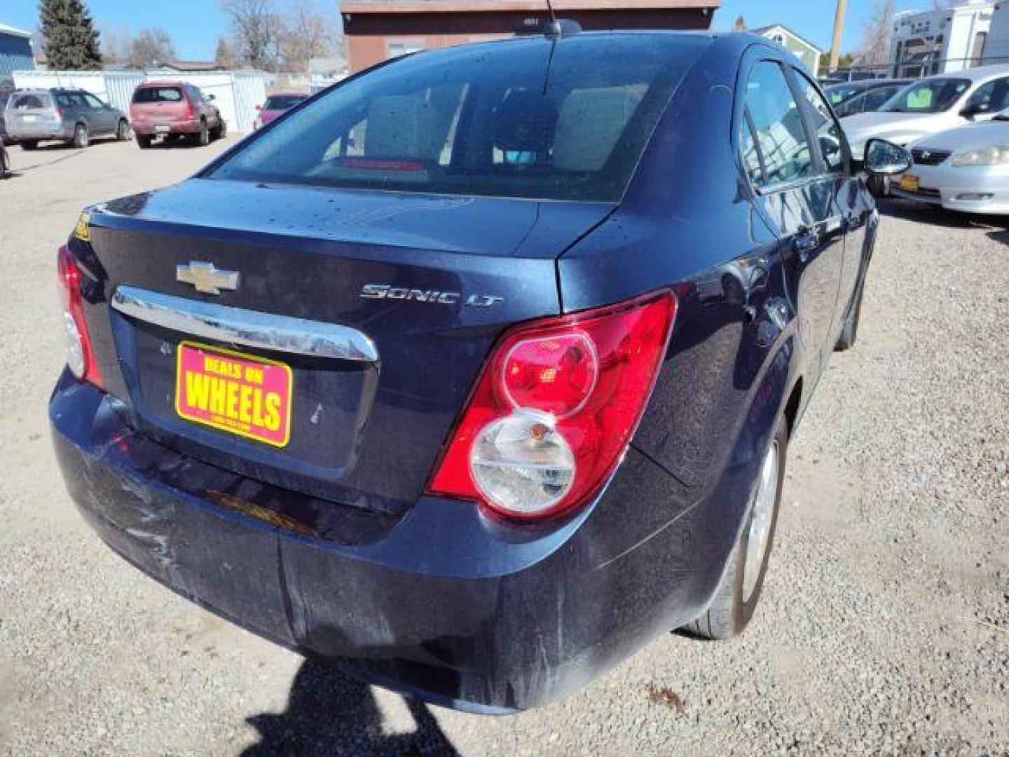 2015 Chevrolet Sonic LT Auto Sedan (1G1JC5SHXF4) with an 1.8L L4 DOHC 24V engine, 6-Speed Automatic transmission, located at 4801 10th Ave S,, Great Falls, MT, 59405, (406) 564-1505, 0.000000, 0.000000 - Photo#4