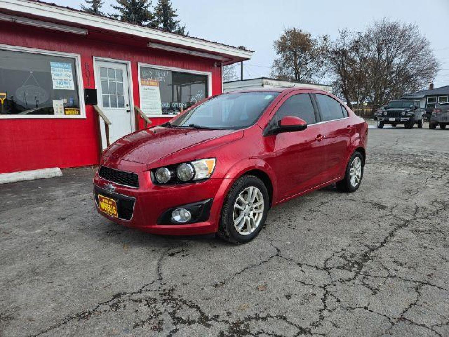 2015 Chevrolet Sonic LT Auto Sedan (1G1JC5SH4F4) with an 1.8L L4 DOHC 24V engine, 6-Speed Automatic transmission, located at 601 E. Idaho St., Kalispell, MT, 59901, 0.000000, 0.000000 - Photo#0