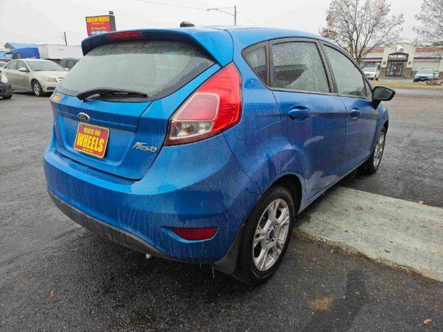 2015 Ford Fiesta SE Hatchback (3FADP4EJ6FM) with an 1.6L L4 DOHC 16V engine, located at 601 E. Idaho St., Kalispell, MT, 59901, 0.000000, 0.000000 - Photo#4