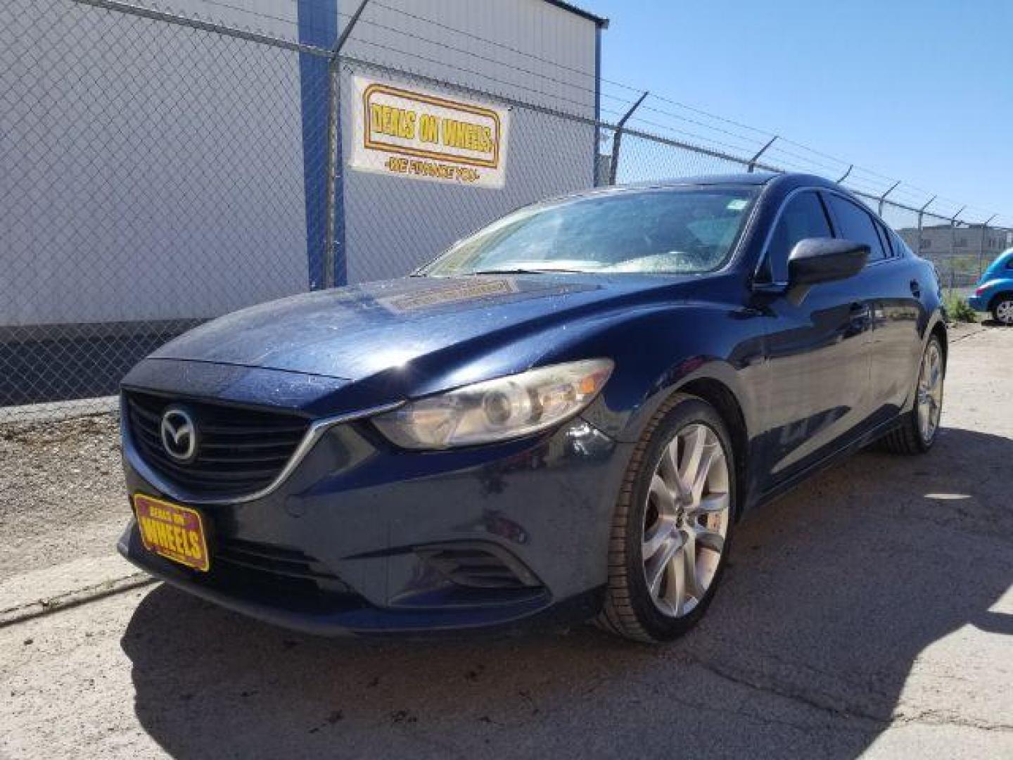 2015 Deep Crystal Blue Mazda Mazda6 i Touring (JM1GJ1V56F1) with an 2.5L L4 DOHC 16V engine, 6-Speed Automatic transmission, located at 4047 Montana Ave., Billings, MT, 59101, 45.770847, -108.529800 - Photo#0