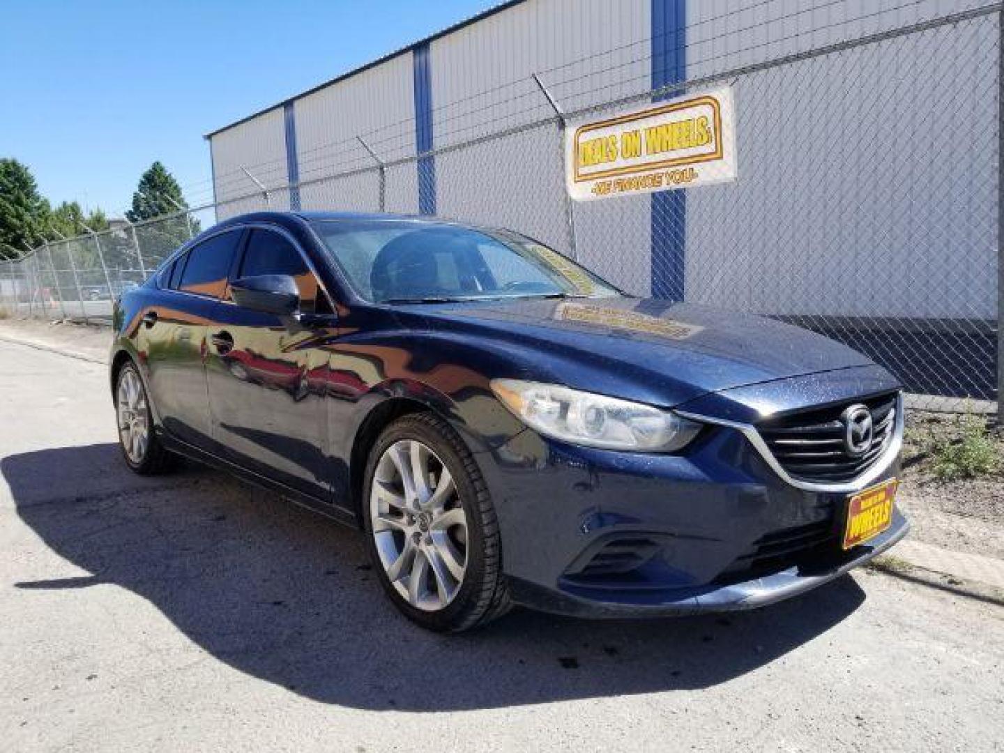 2015 Deep Crystal Blue Mazda Mazda6 i Touring (JM1GJ1V56F1) with an 2.5L L4 DOHC 16V engine, 6-Speed Automatic transmission, located at 4047 Montana Ave., Billings, MT, 59101, 45.770847, -108.529800 - Photo#6